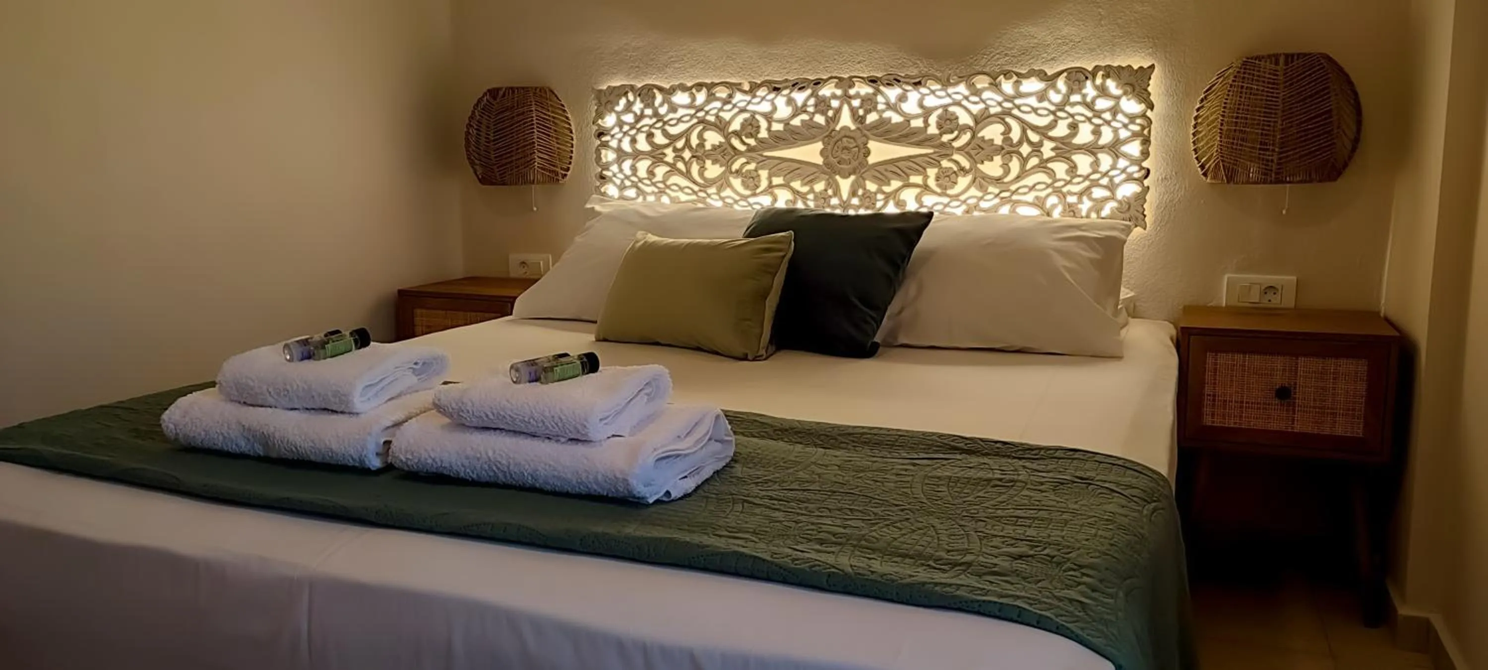 Bed in Niki Apartments