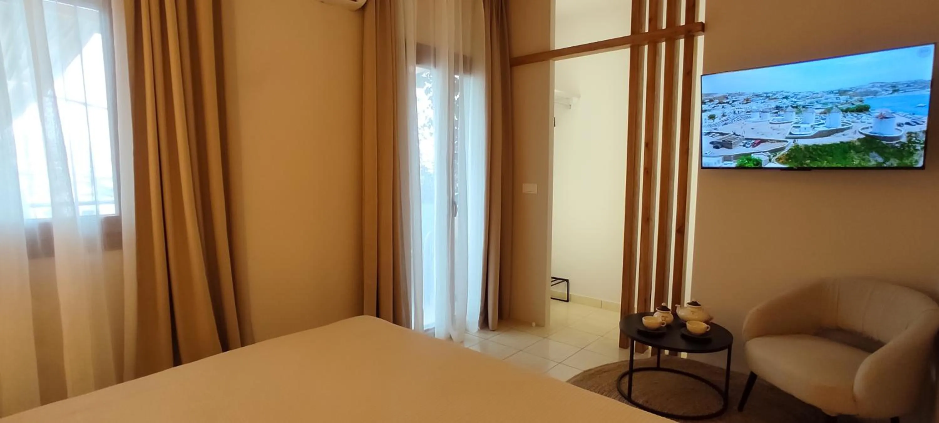 TV and multimedia, Bed in Niki Apartments