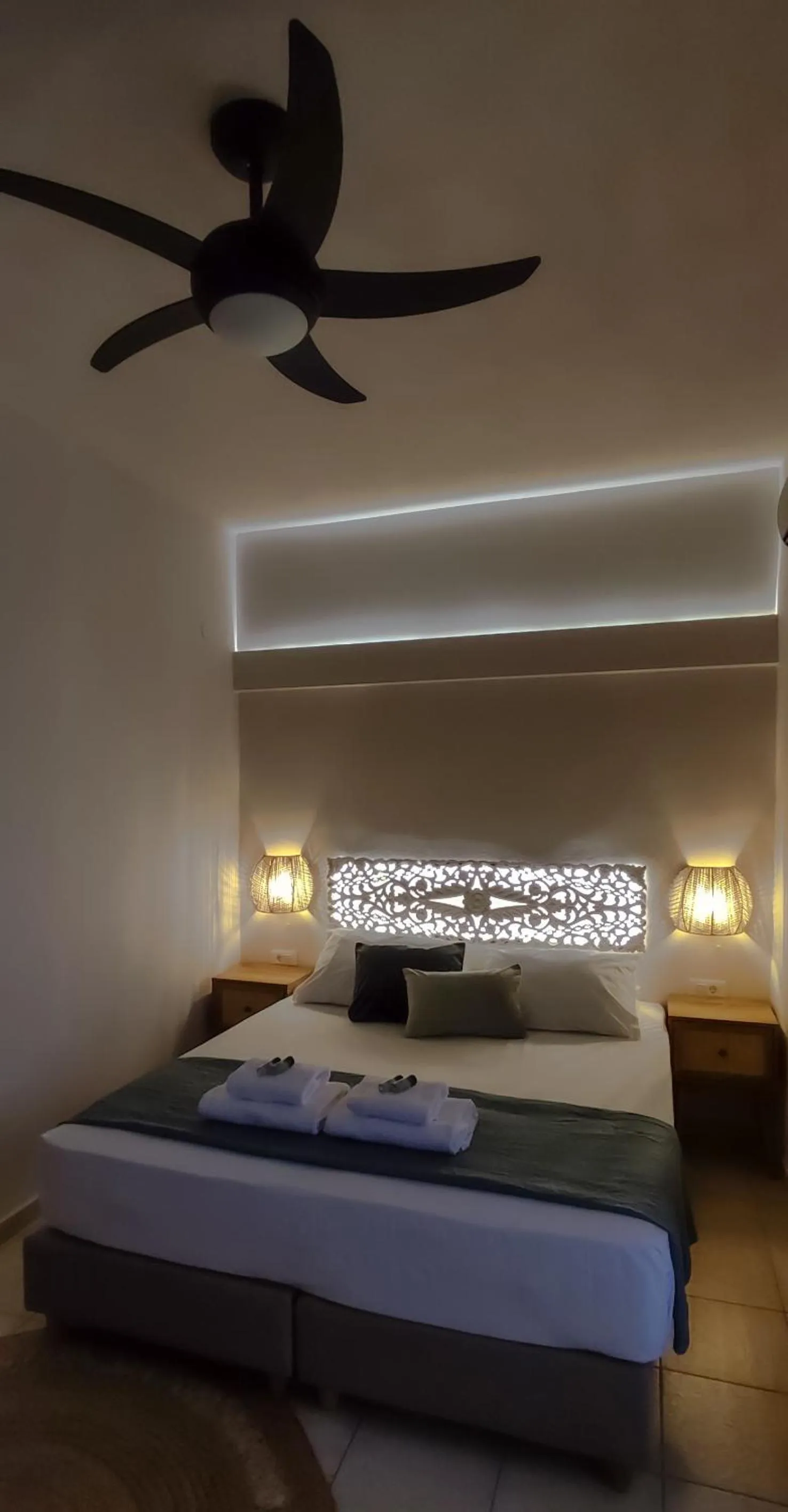 Bed in Niki Apartments