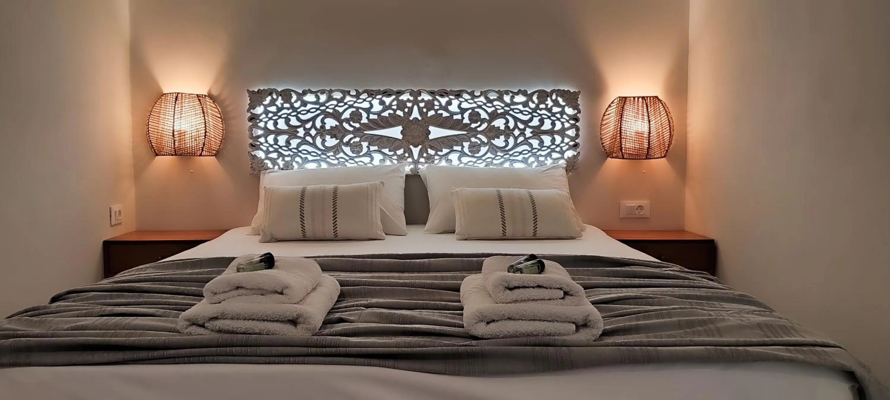 Bed in Niki Apartments