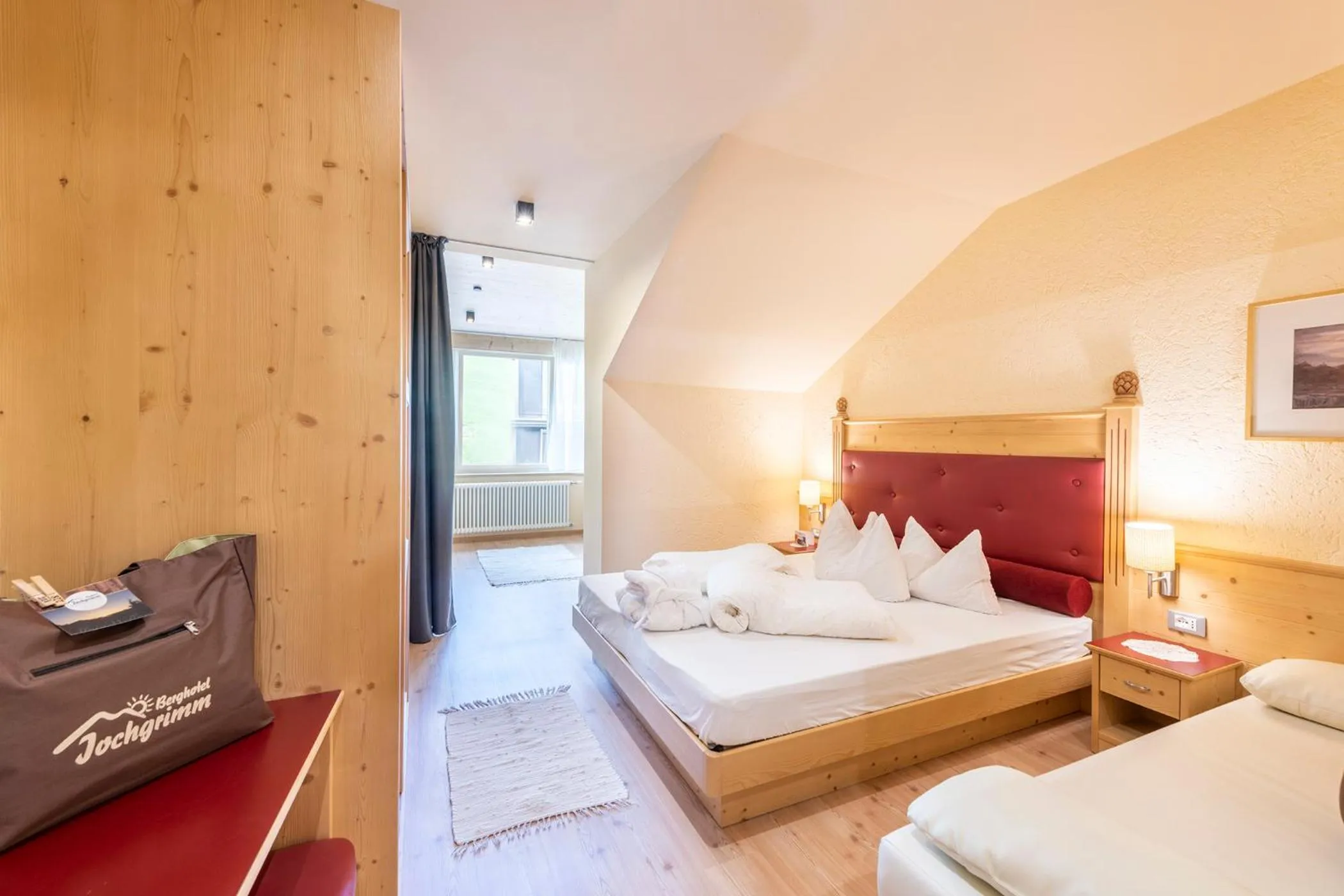 Bed in Berghotel Jochgrimm - Your Dolomites Home