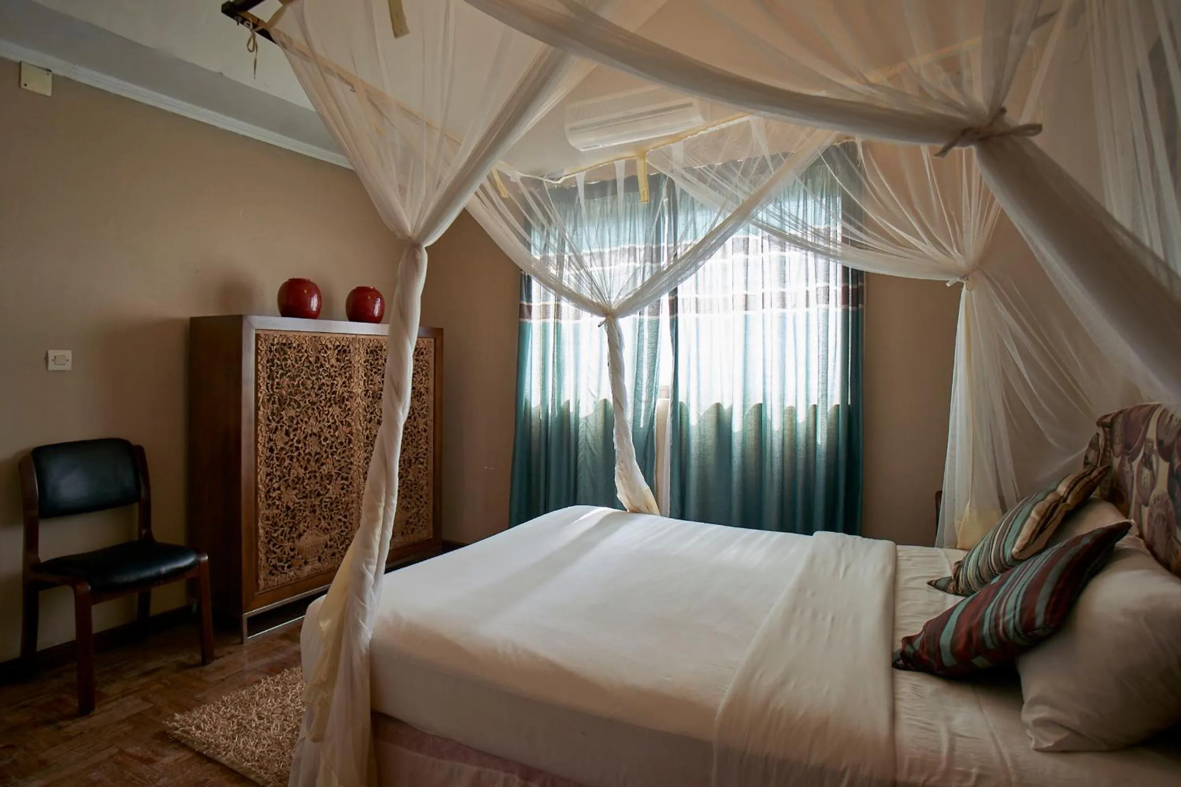 Bed in Catembe Gallery Hotel