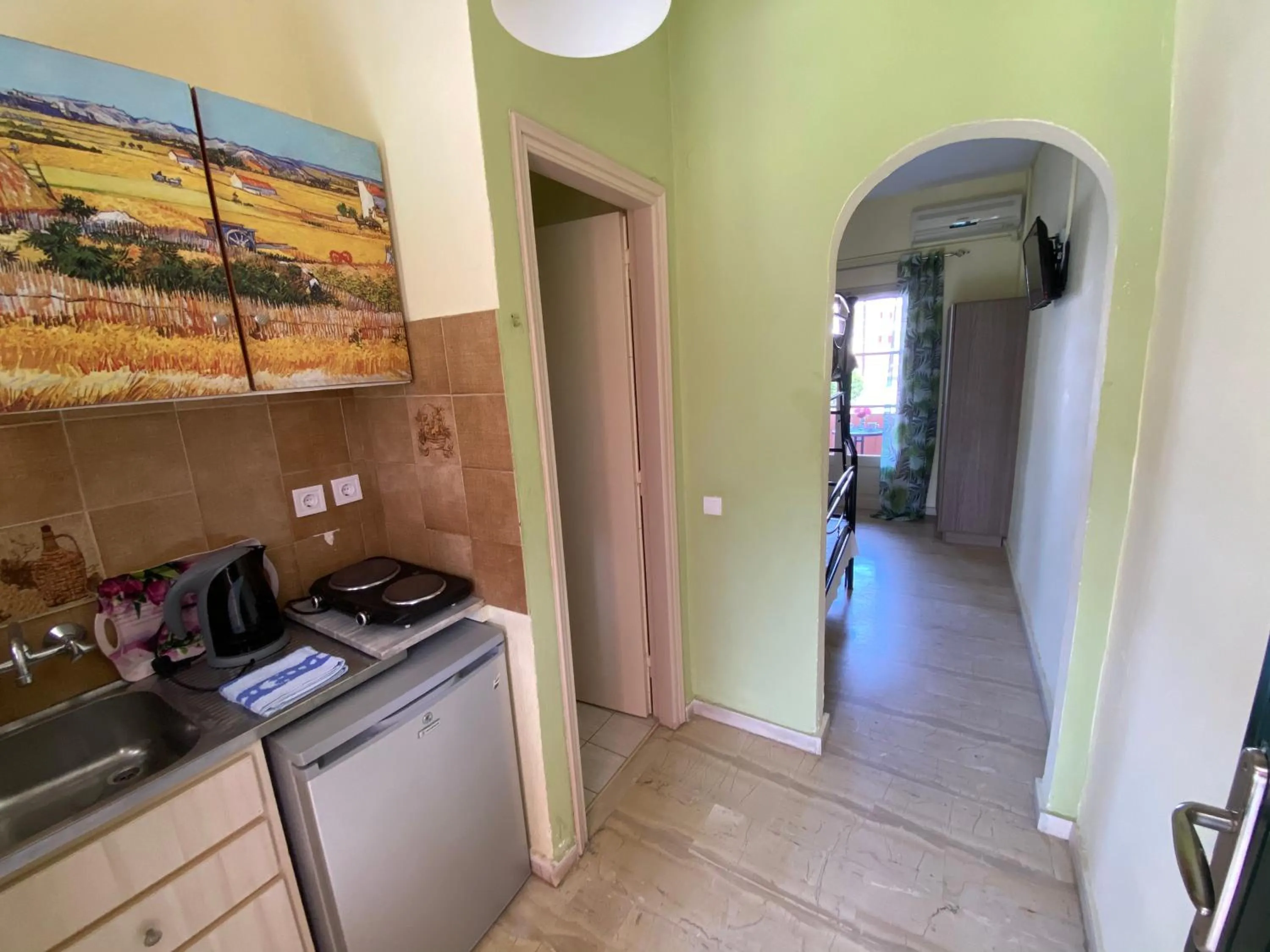 Kitchen or kitchenette in Villa Corfiota Moraitika Beach
