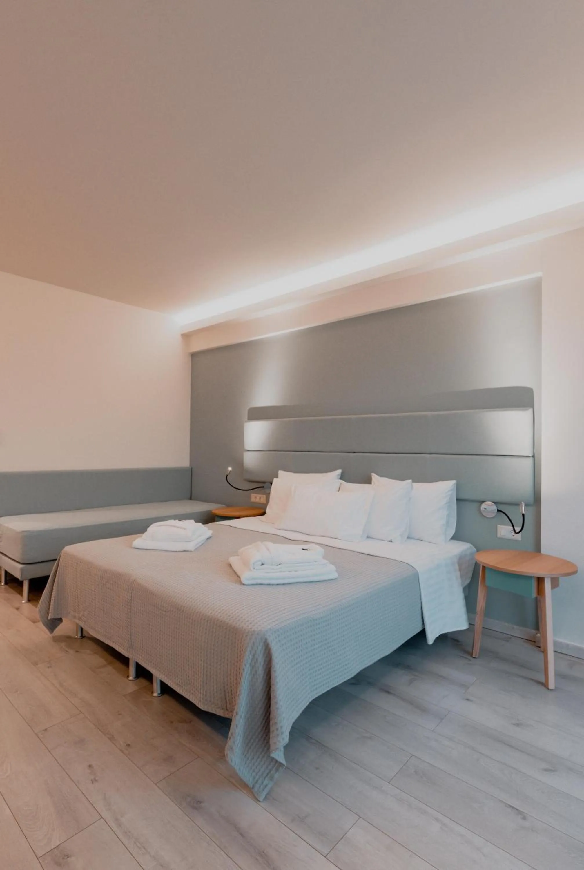 Bed in Palacio del Sol Luxury Apartments
