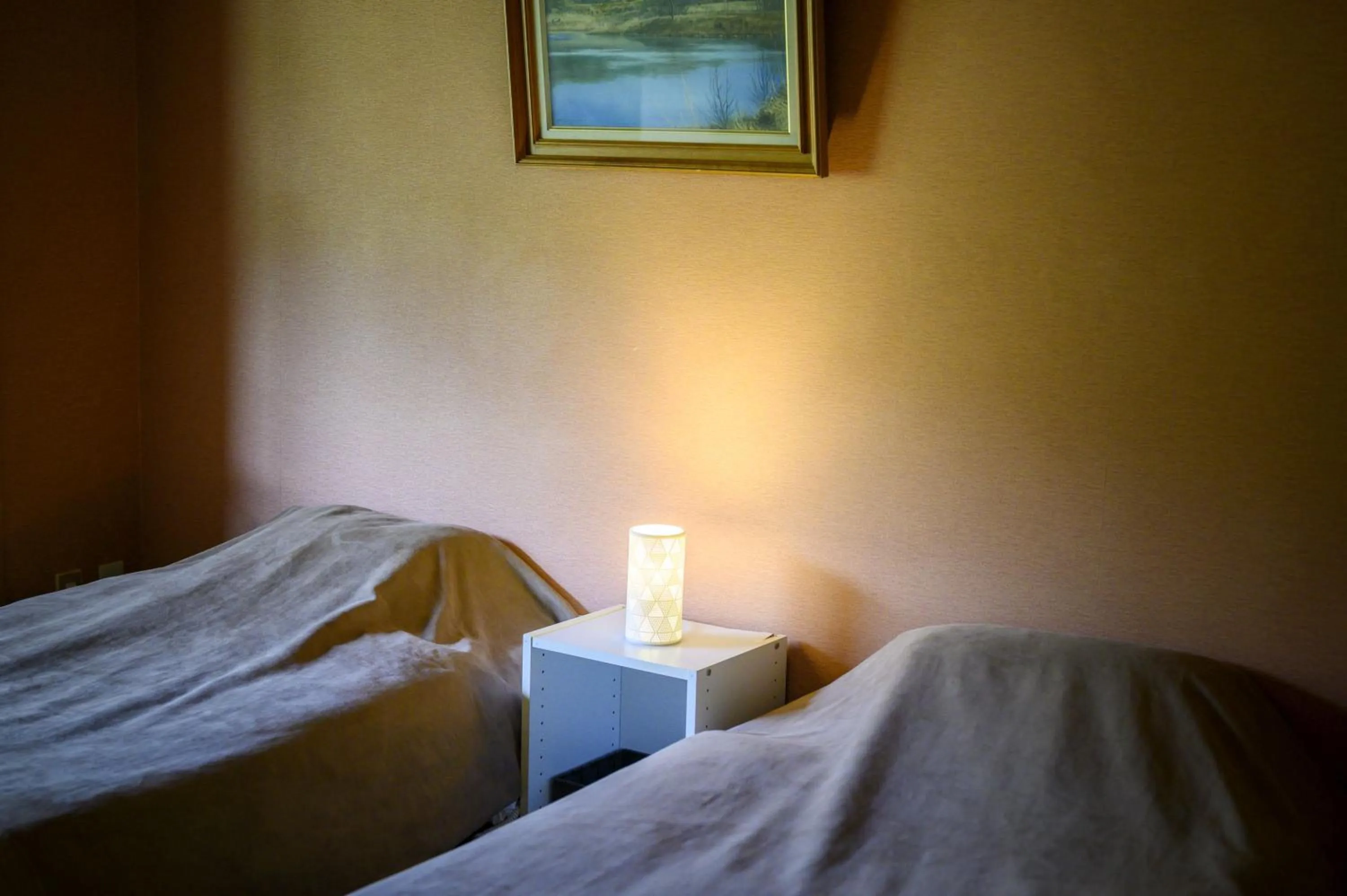 Bed in Takamiya Hotel Jurin