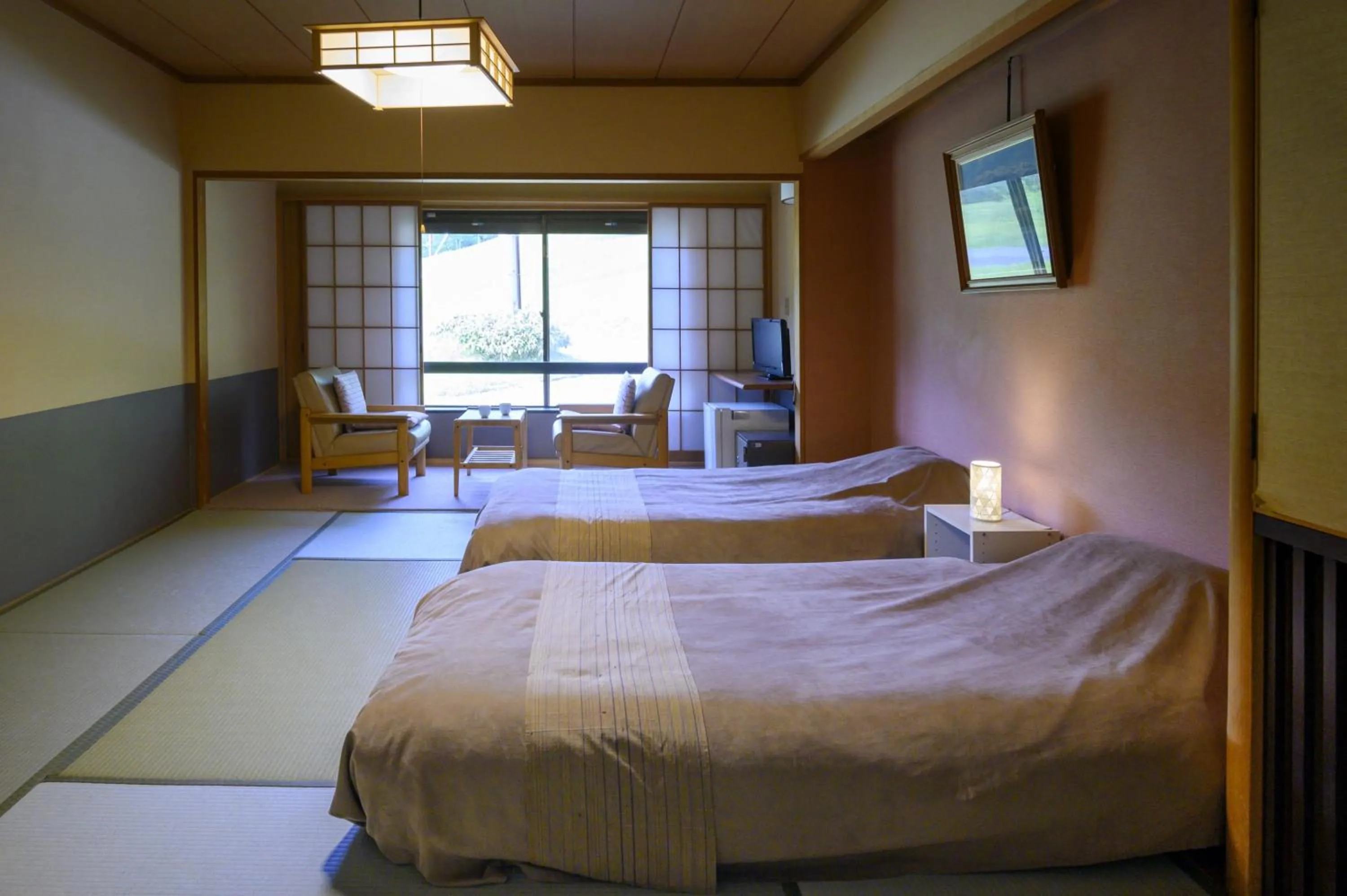 Bed in Takamiya Hotel Jurin