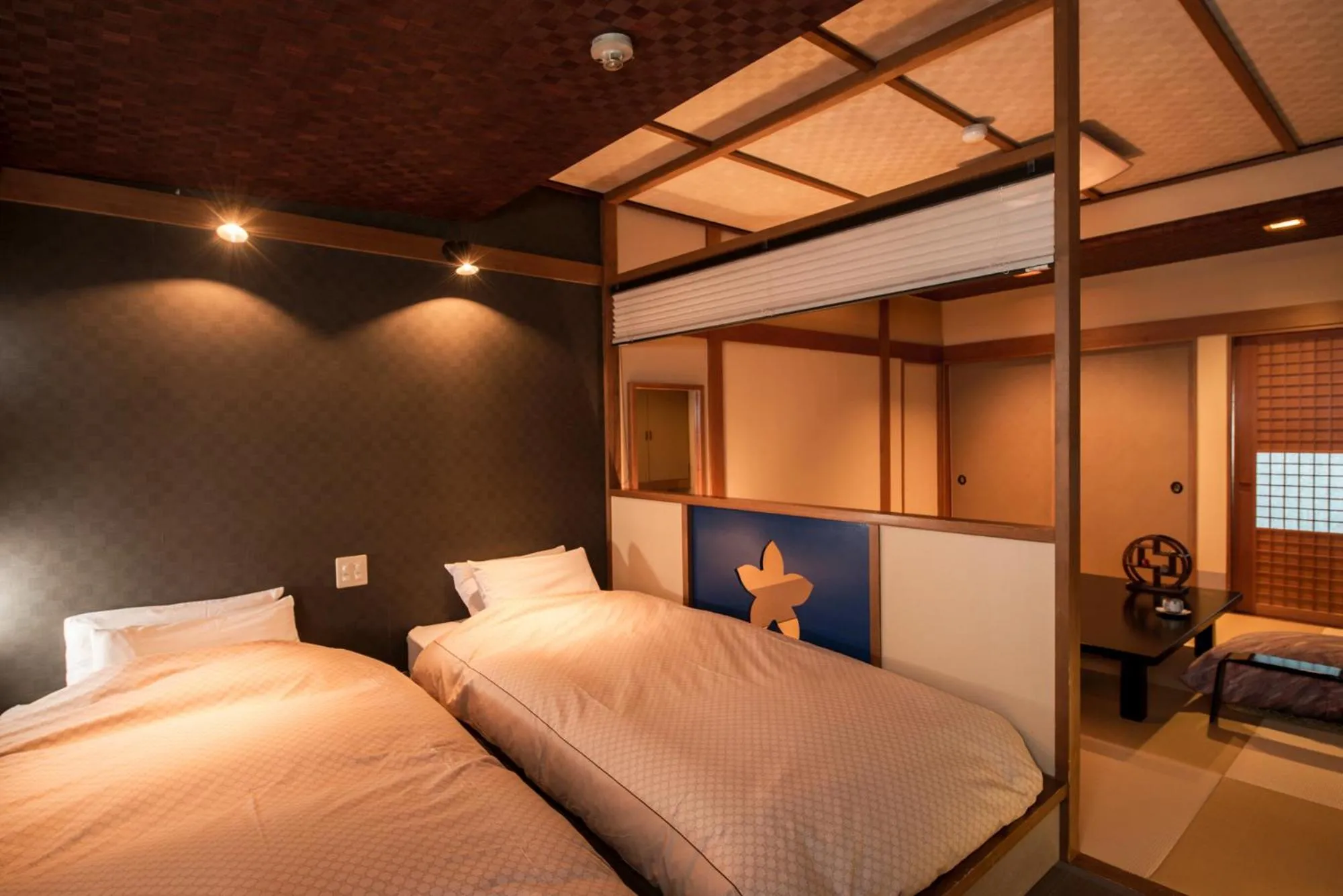 Bed in Takamiya Ryokan Miyamaso