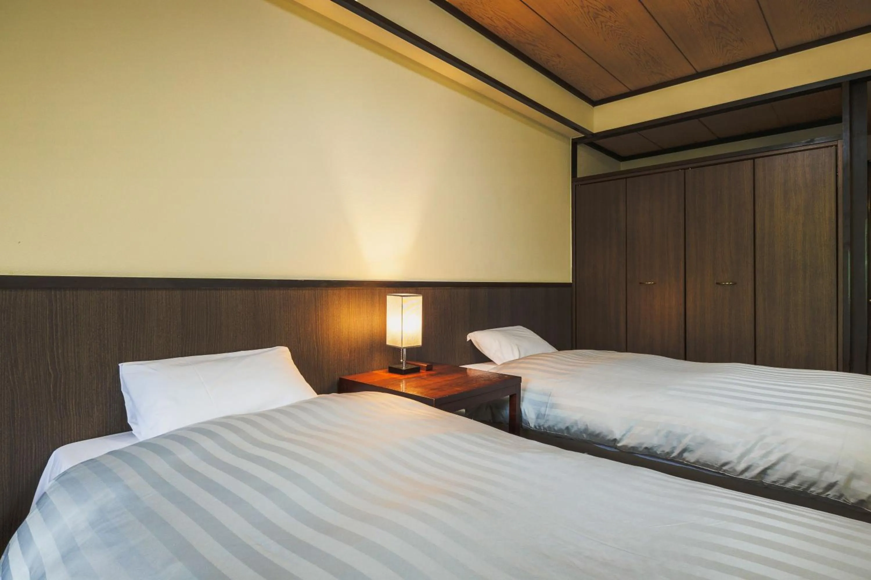 Bed in Takamiya Hotel Hammond