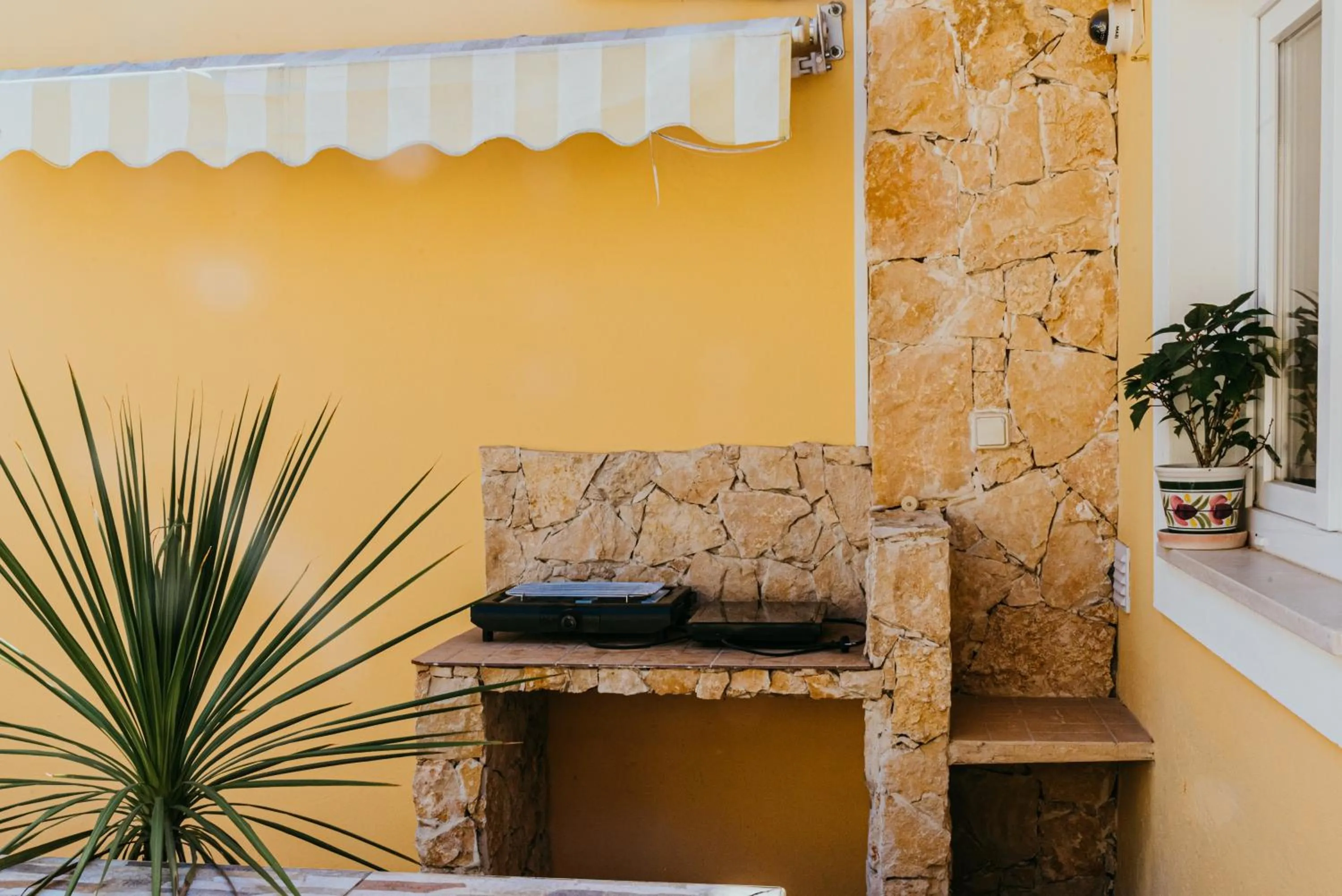 BBQ facilities in Happy House Comfort Plus