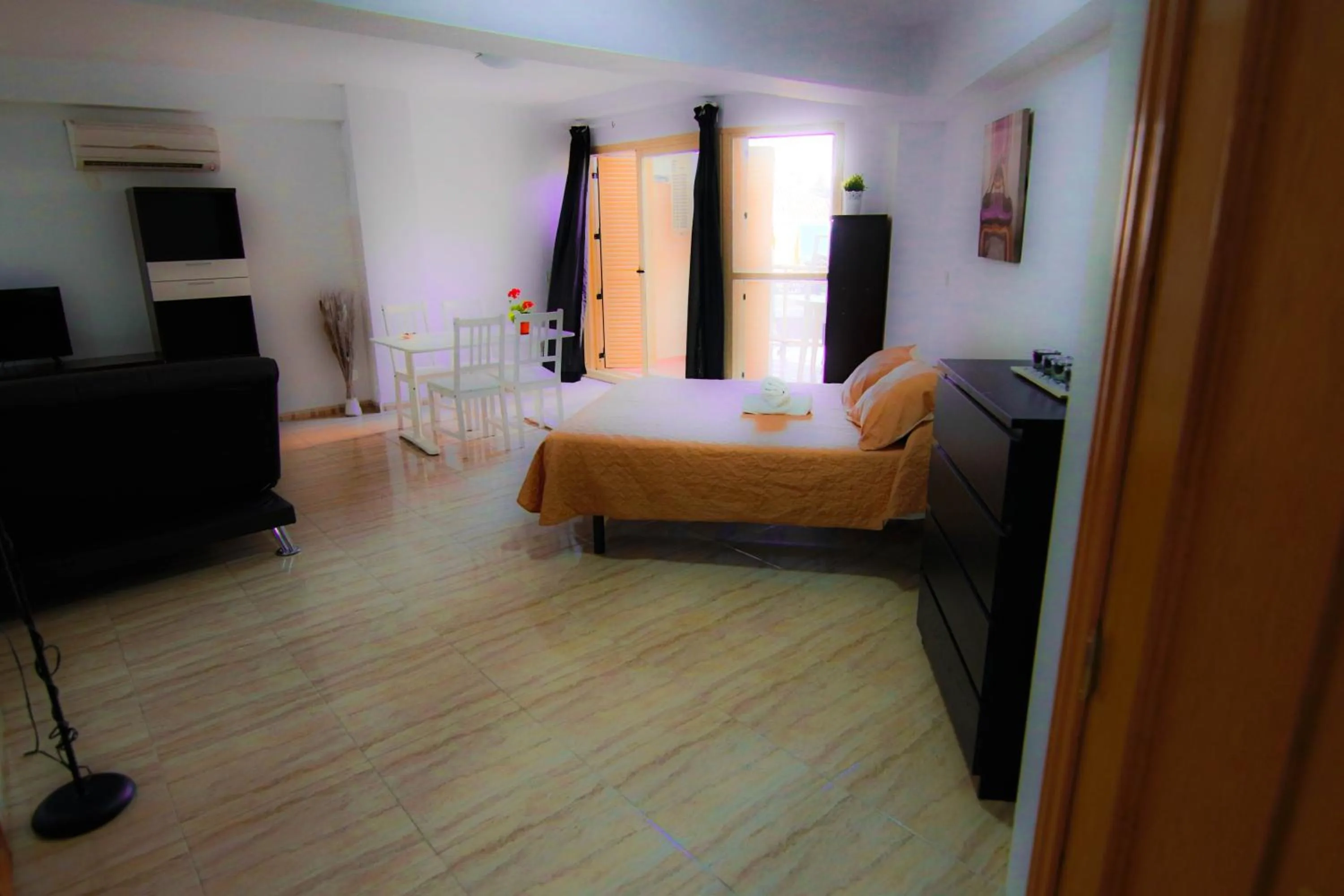 Photo of the whole room, Bed in Puerta del Sol TRM only adults Aparts