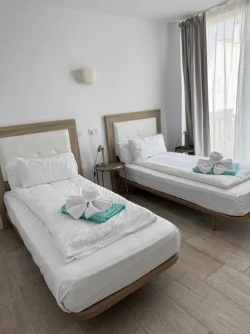 Bed in Orange Colom - Seaside Apartments
