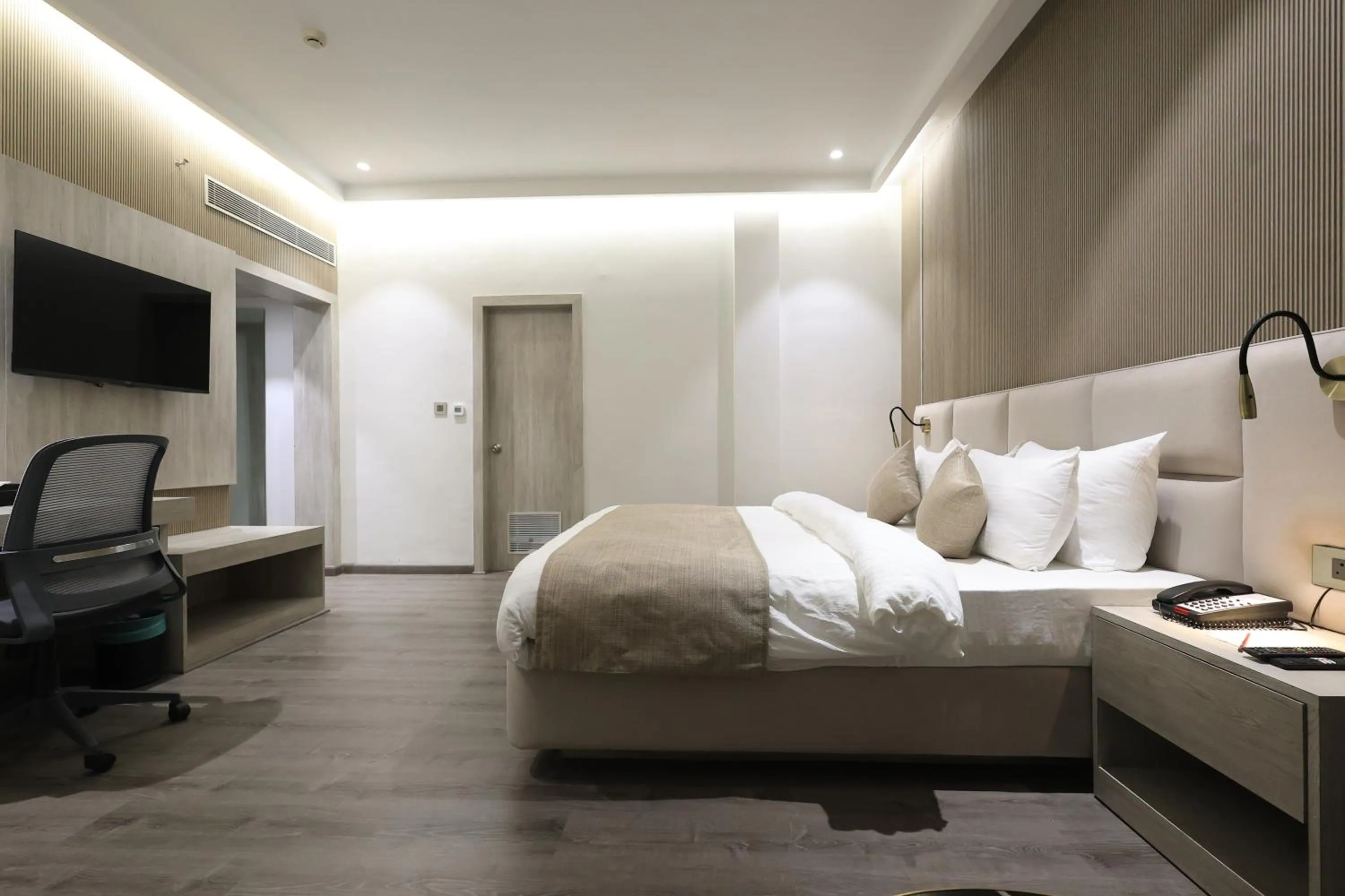 Bed in Hotel Swarn Towers