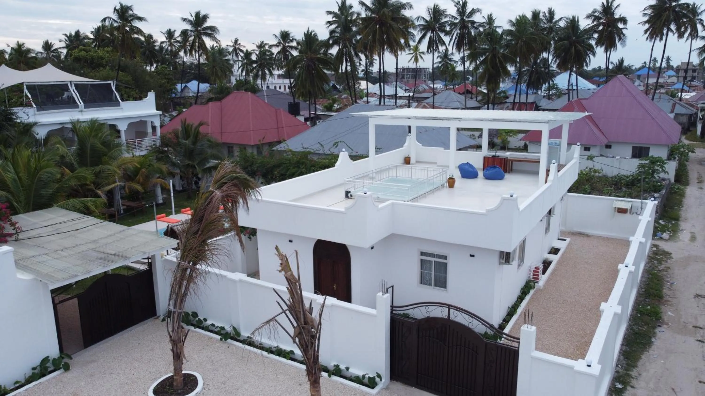 Property building in Paje White House