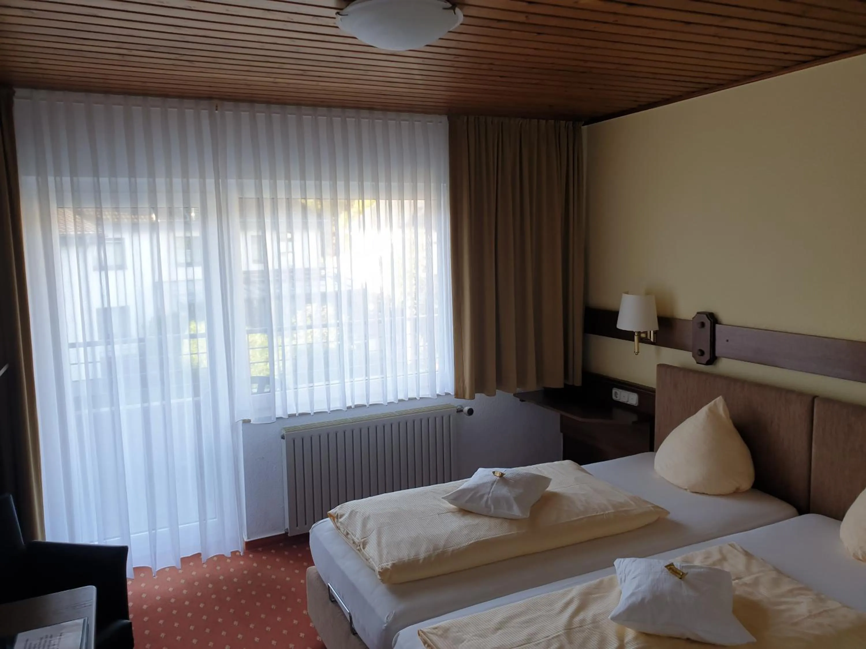 Bed in Kurparkhotel-Gemünd