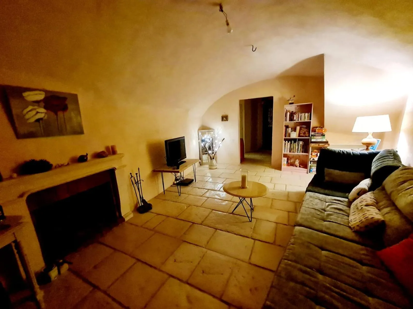 Communal lounge/ TV room in Maison des Bourgades