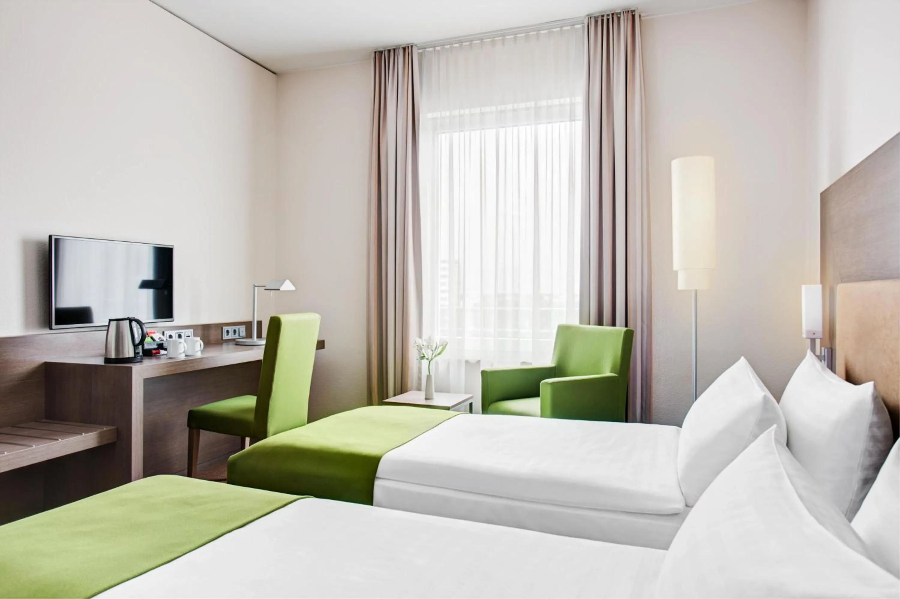 Photo of the whole room, Bed in IntercityHotel Mainz