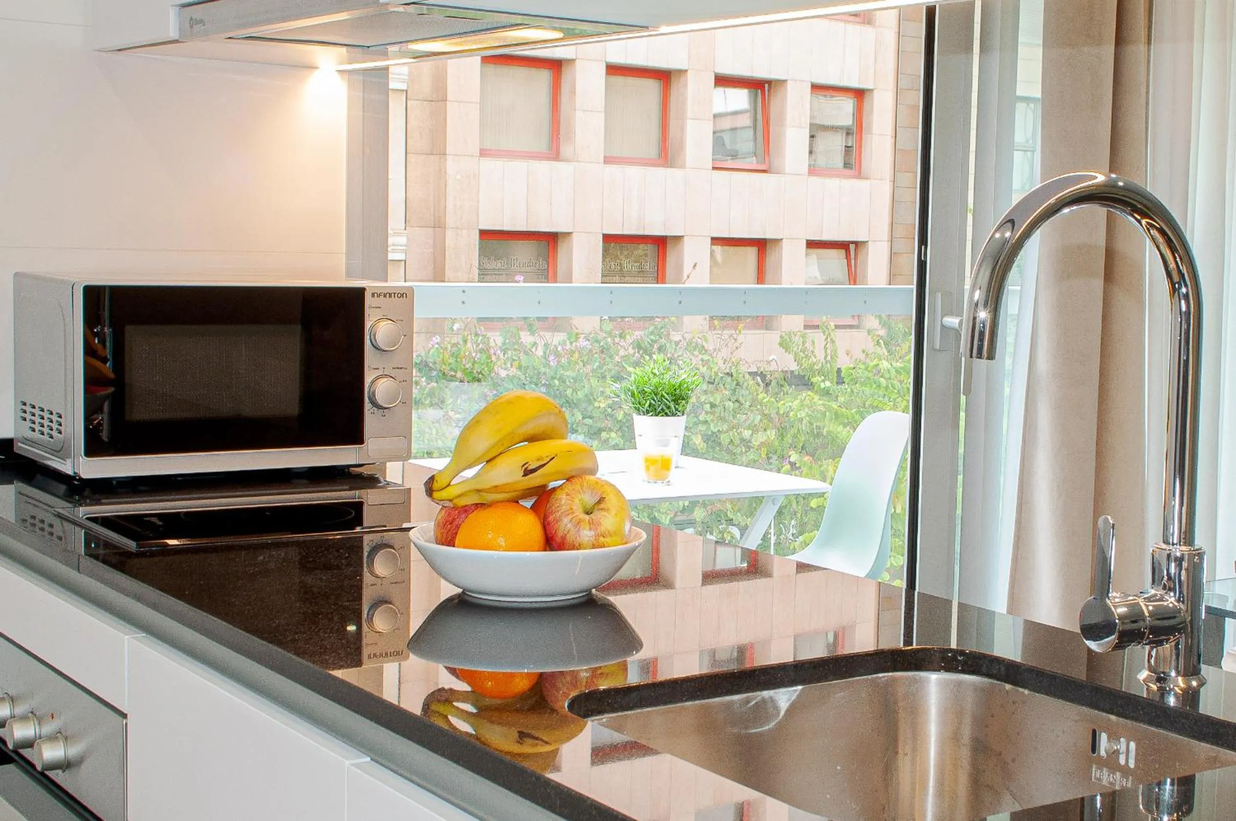 Kitchen or kitchenette in Holihome Rambla 24
