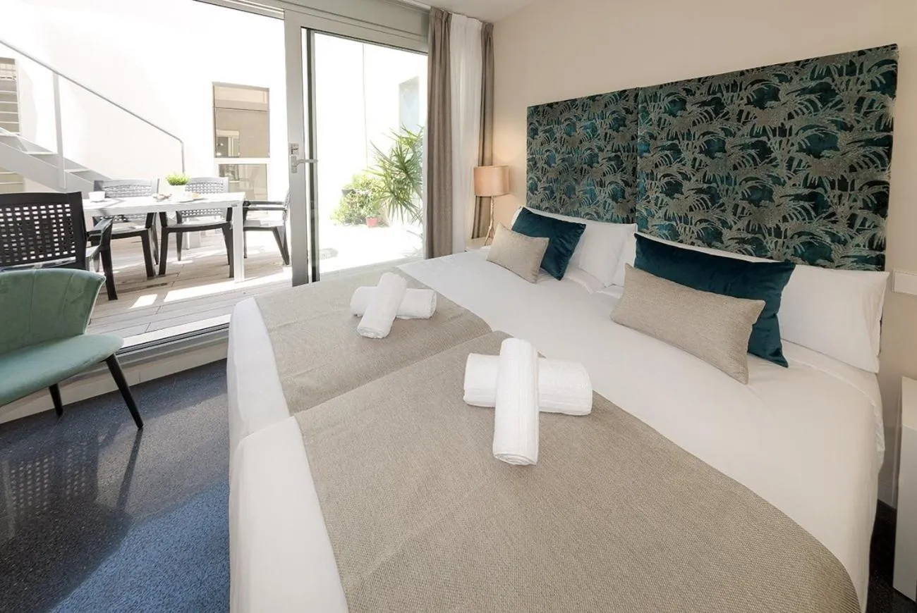 Bed in Holihome Rambla 24