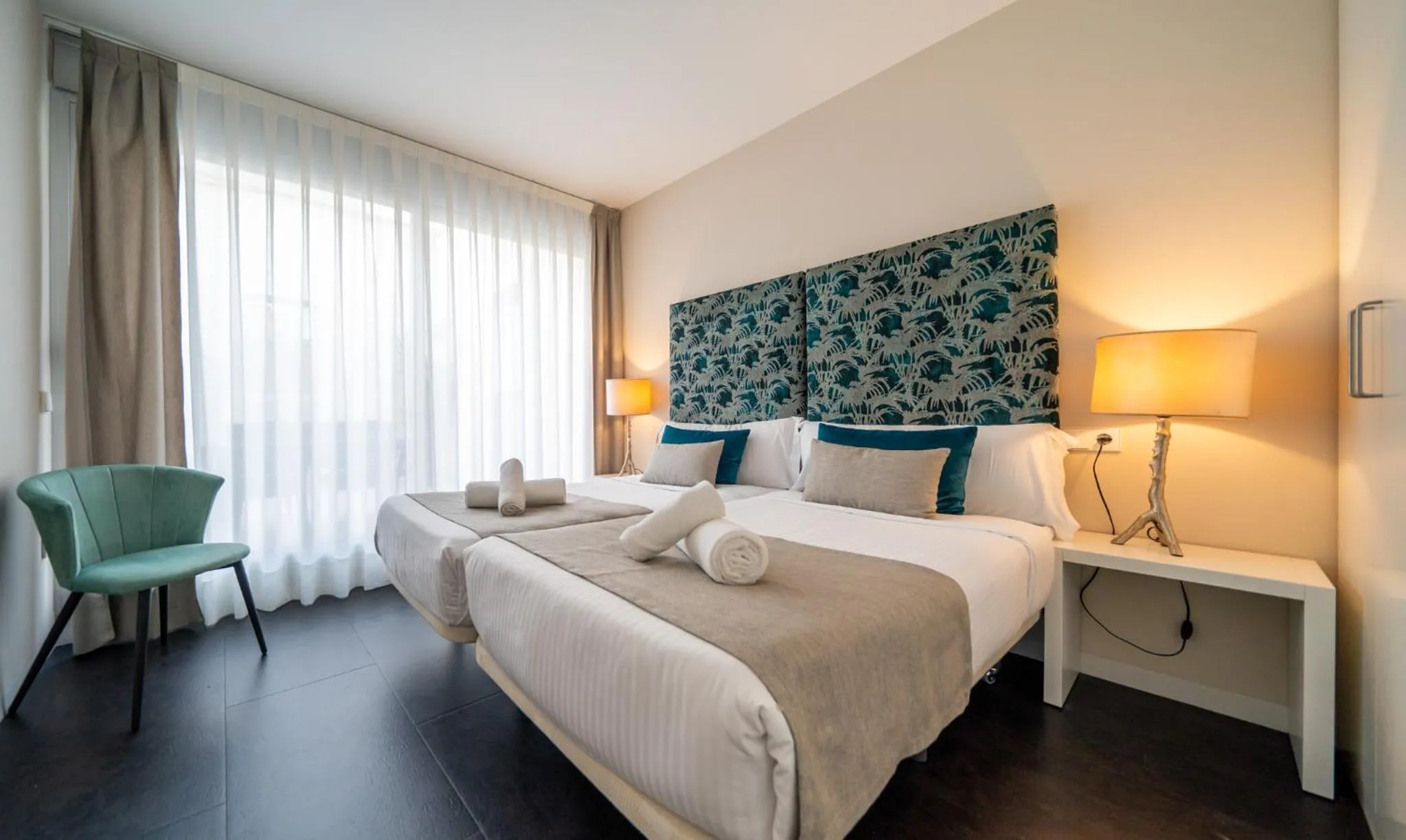 Bed in Holihome Rambla 24