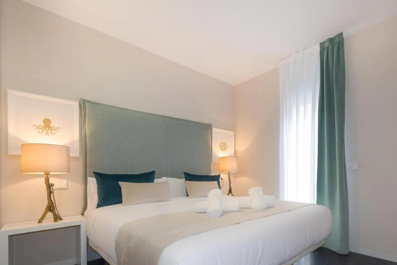 Bed in Holihome Rambla 24