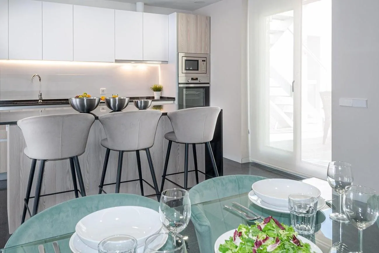 Kitchen or kitchenette in Holihome Rambla 24