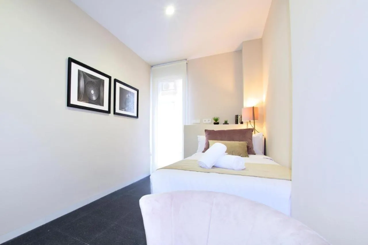 Bed in Holihome Rambla 24