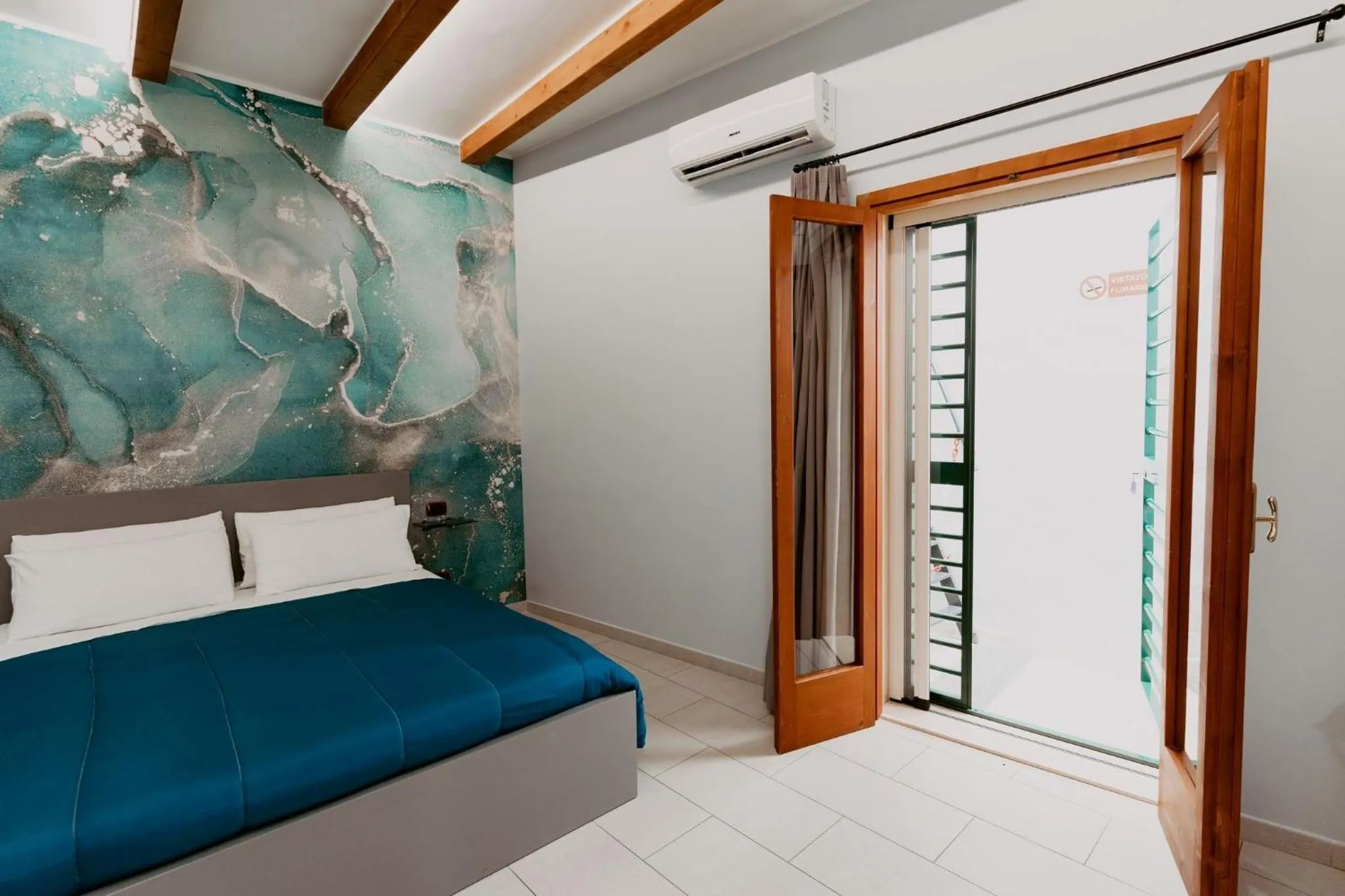 Photo of the whole room, Bed in Dimora L'Etual