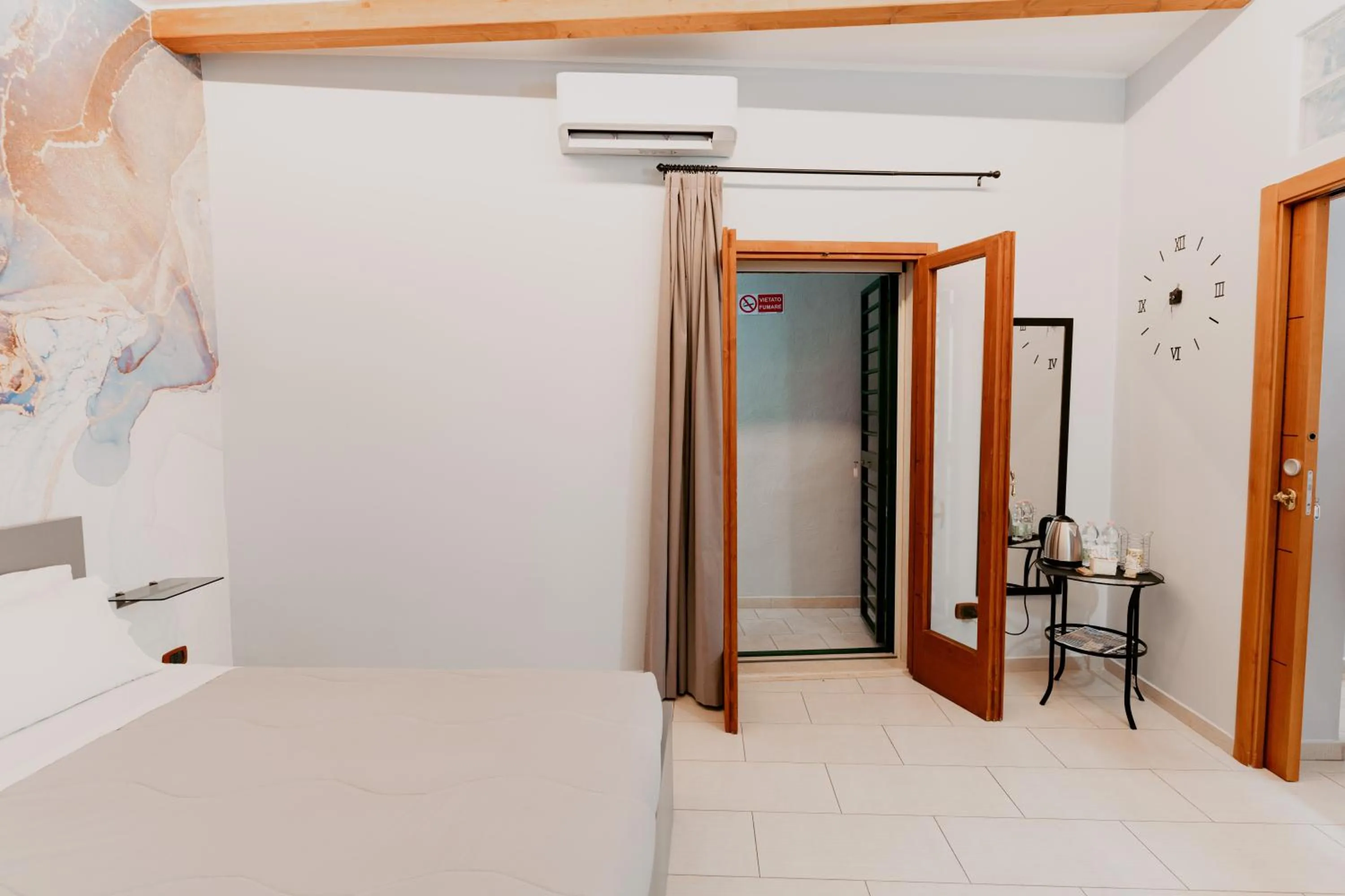 Photo of the whole room, Bed in Dimora L'Etual