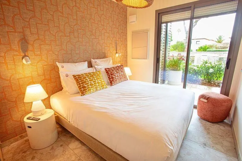 Bed in Hôtel La Ménado