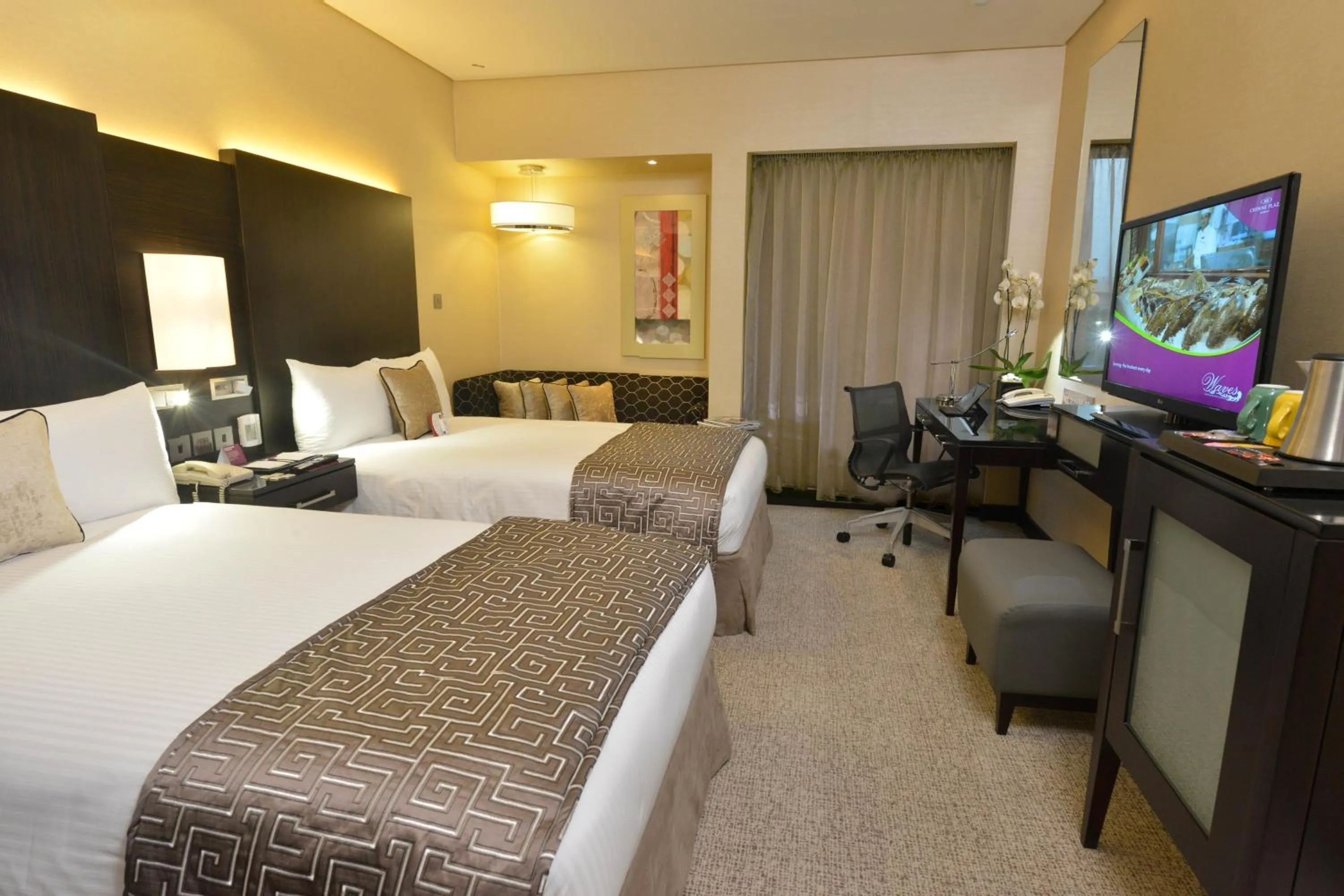 Photo of the whole room, Bed in Crowne Plaza Bahrain by IHG