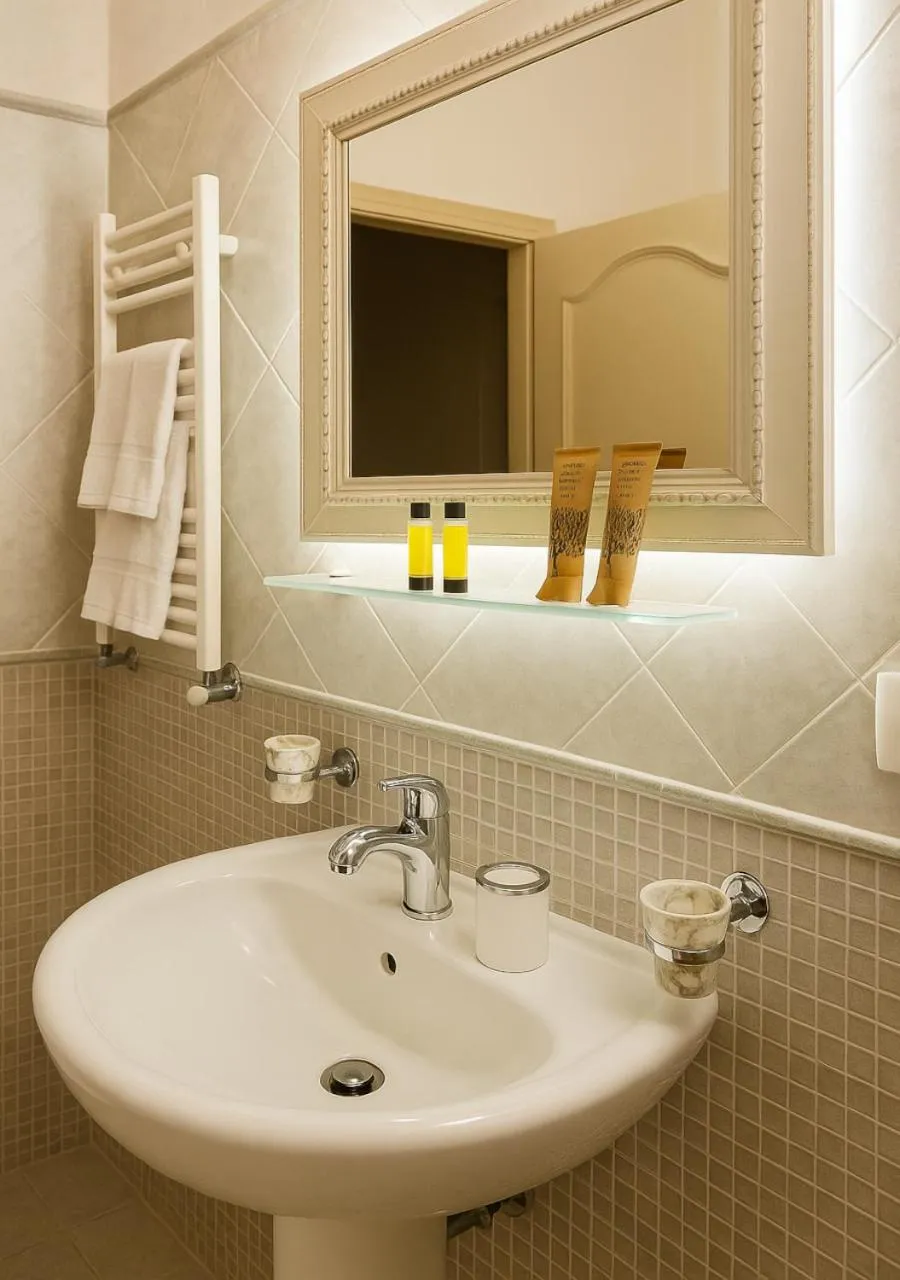 Bathroom in Hotel Borgo di Ciàula