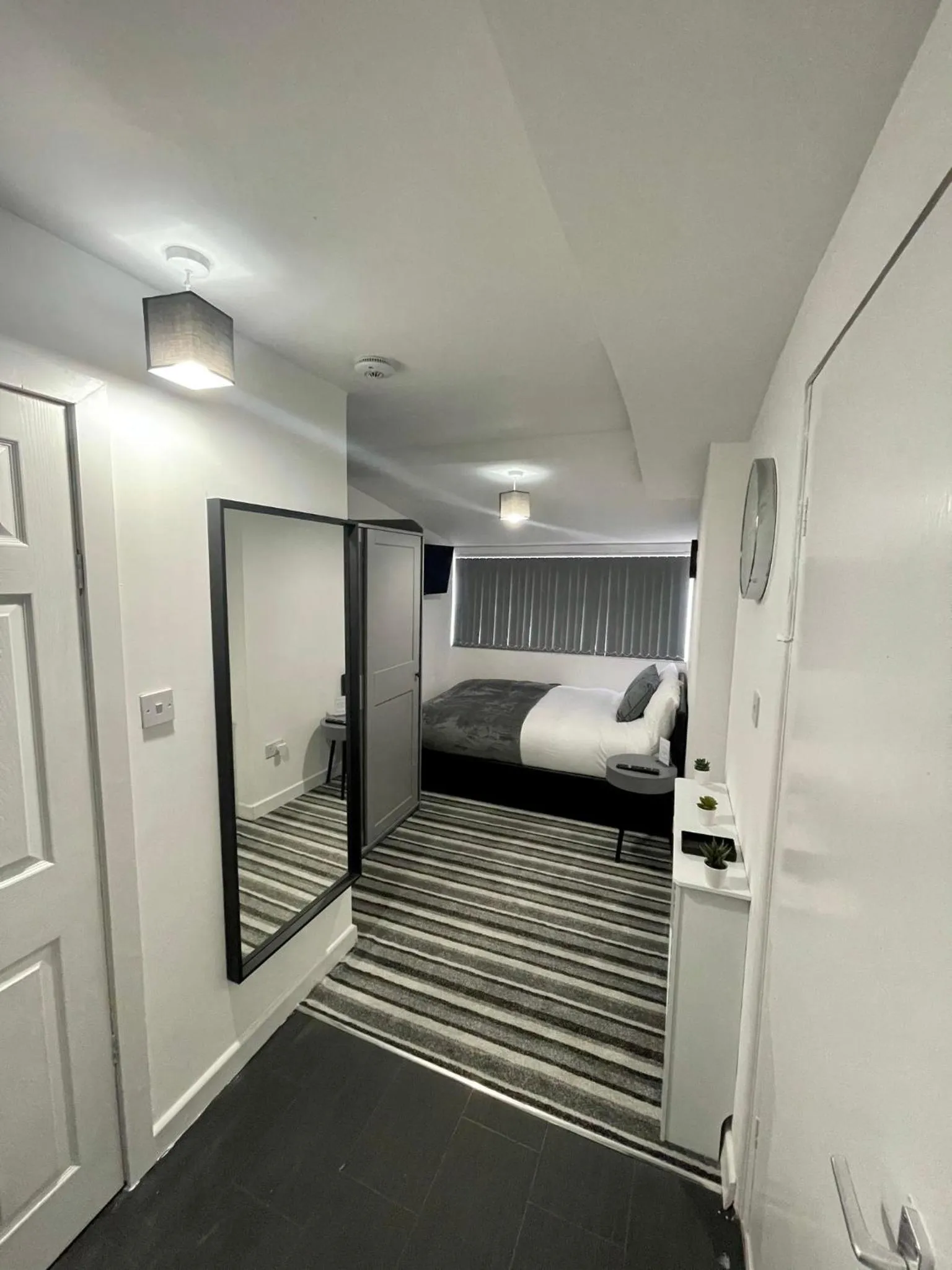 Bedroom, Bed in Wisteria Studio