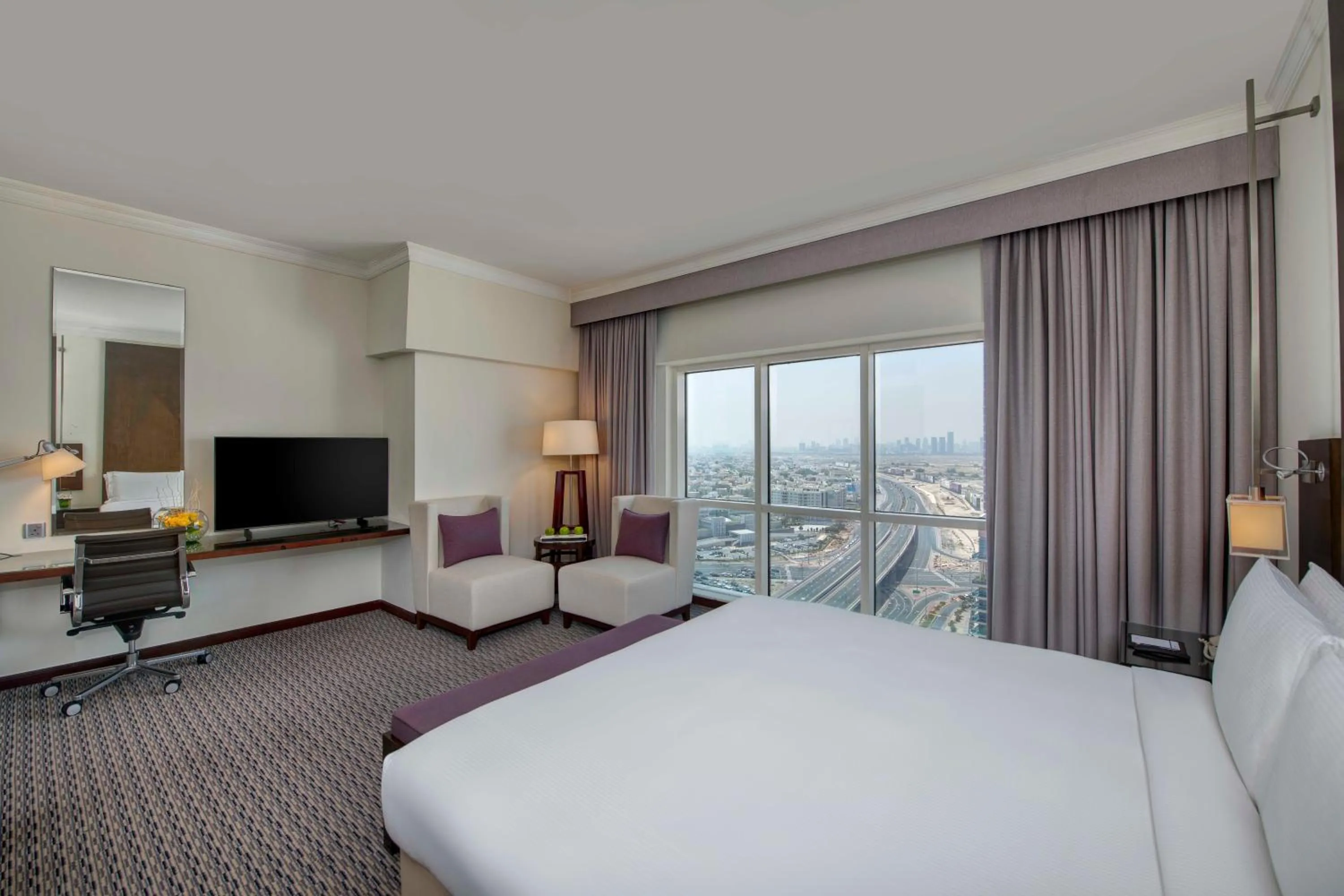 Photo of the whole room, Bed in Media Rotana Dubai