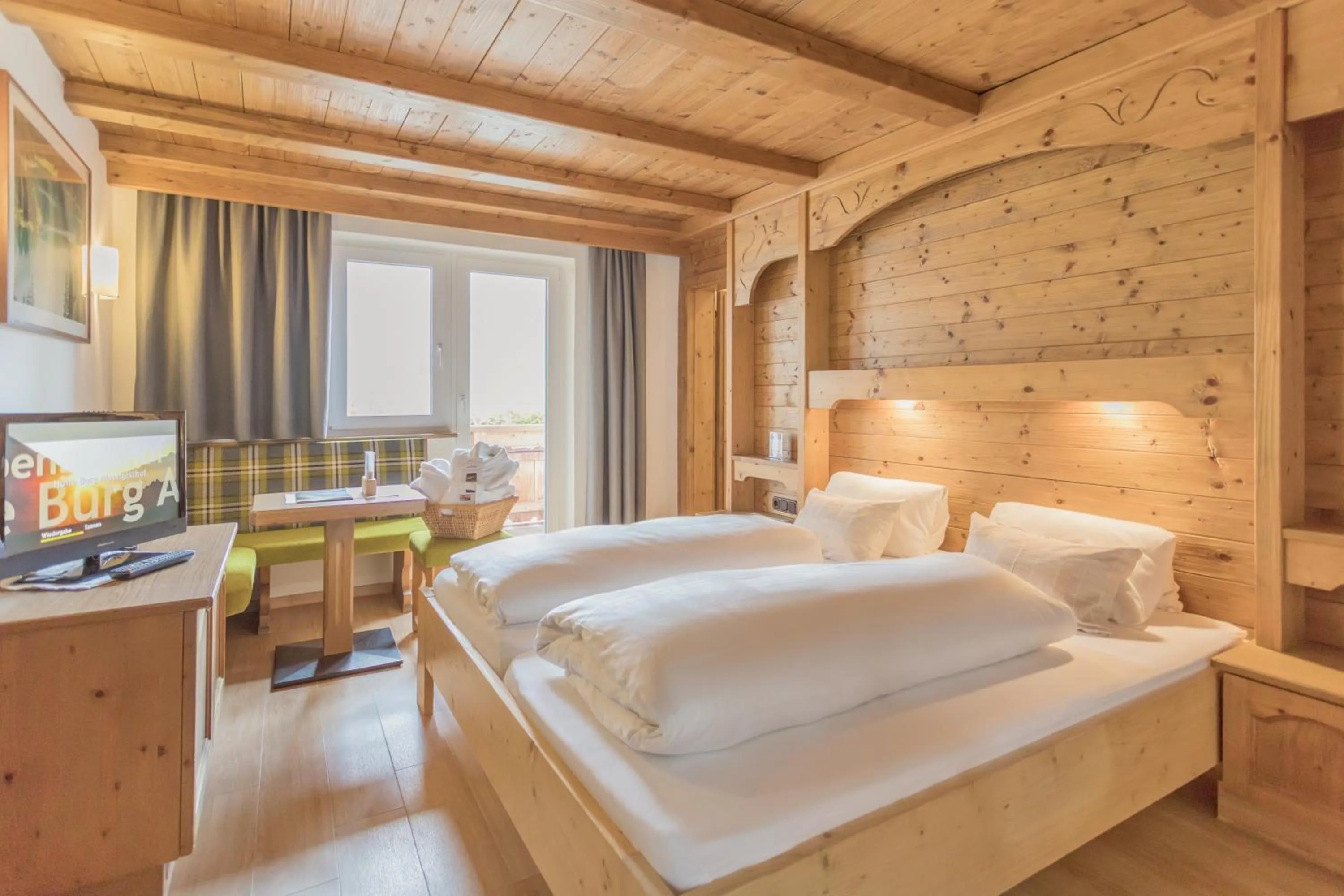 Bed in Alpen Gasthof Apartments Hohe Burg