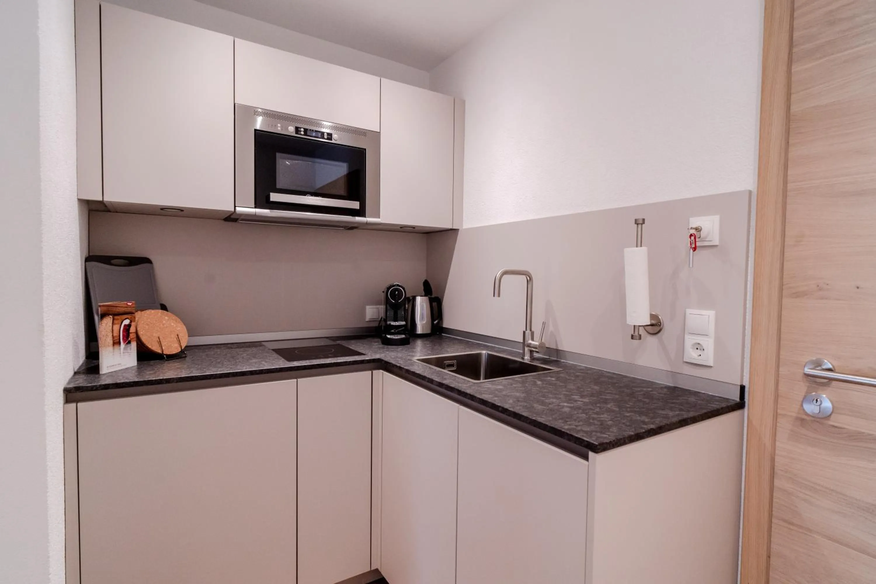 Kitchen or kitchenette in Alpen Gasthof Apartments Hohe Burg