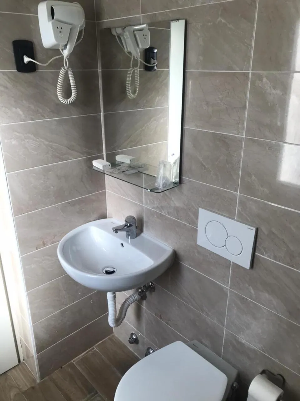 Bathroom in Hotel Costazzurra by Interlux