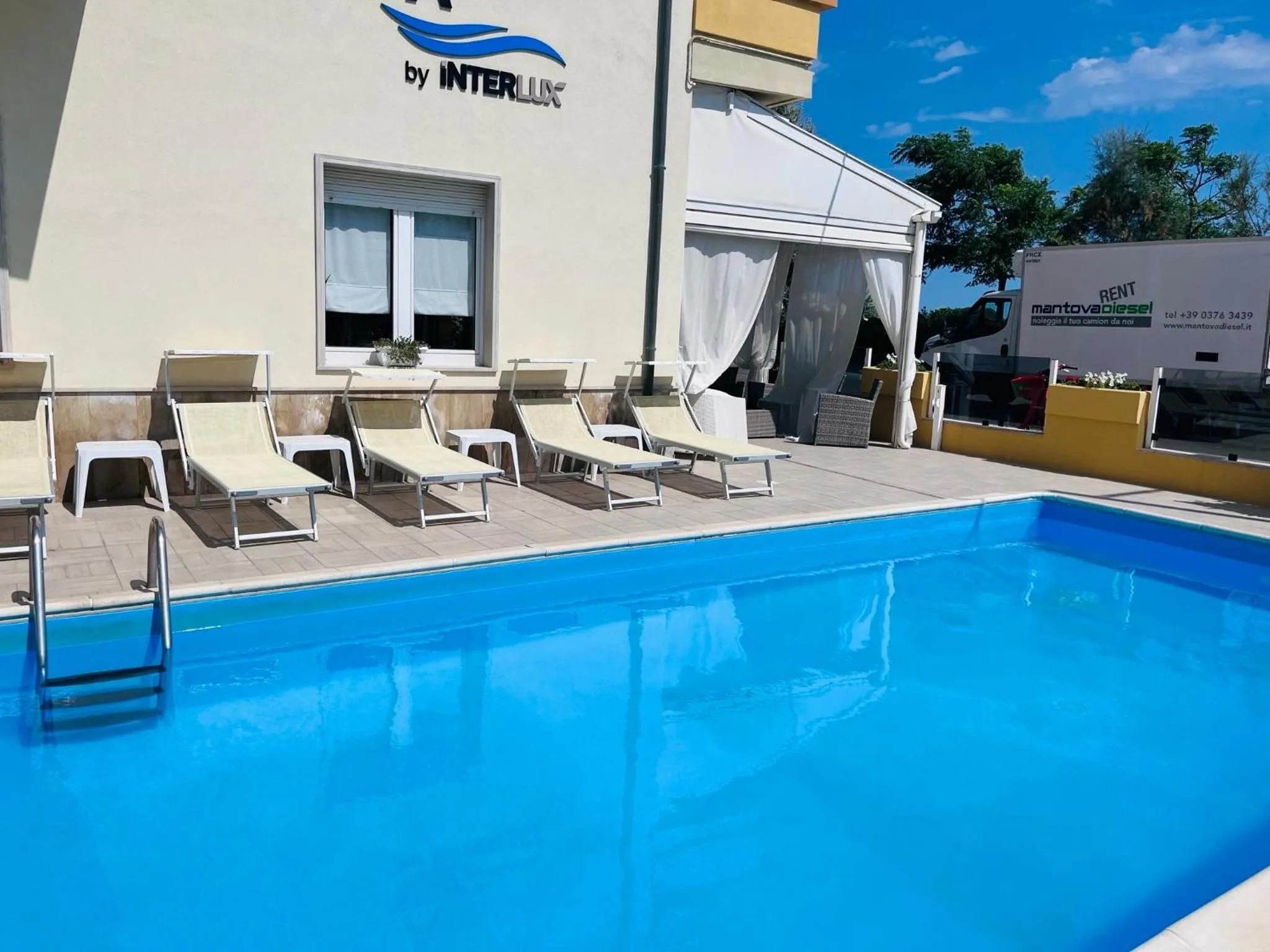 Swimming pool in Hotel Costazzurra by Interlux