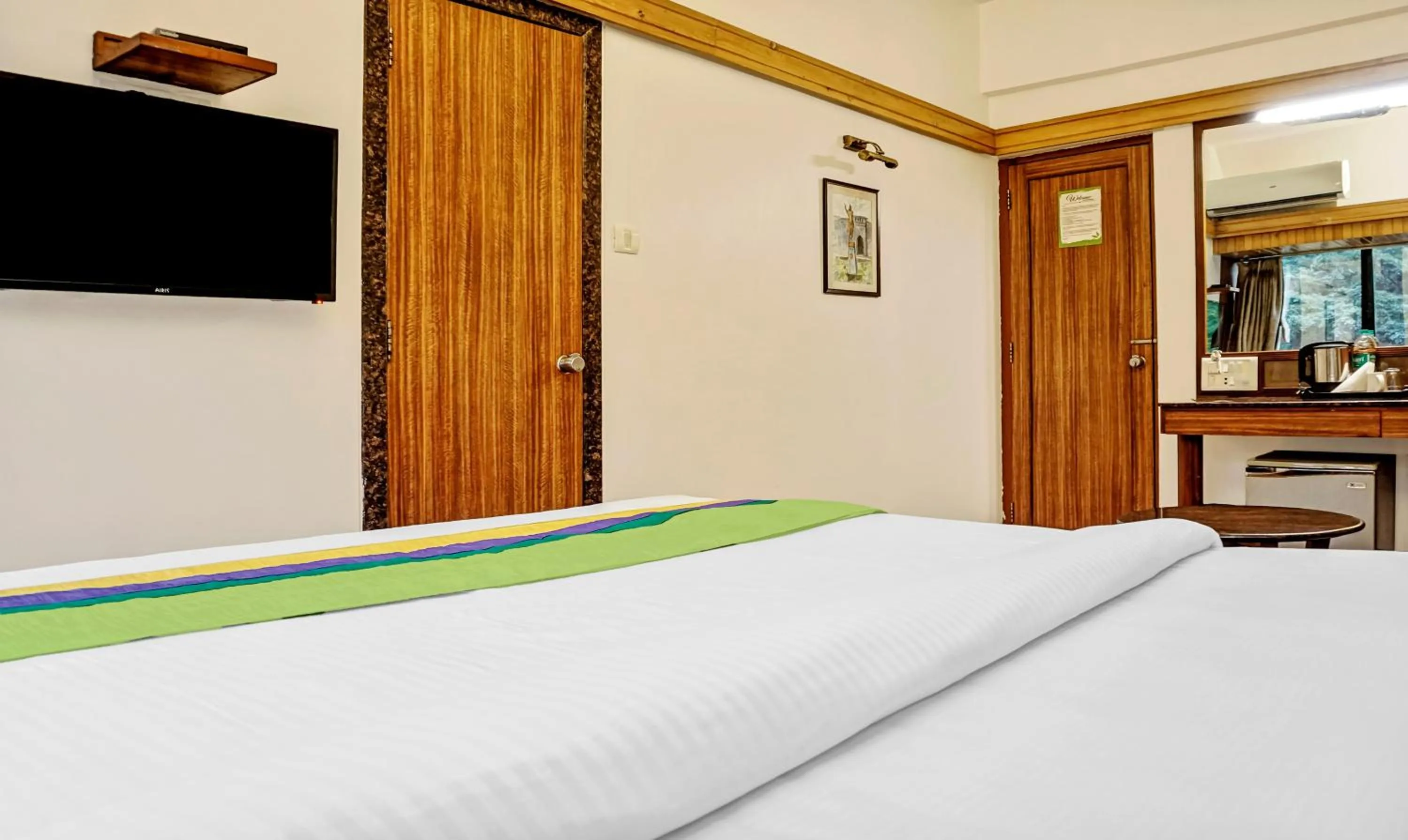 Bedroom, Bed in Treebo Sahara Shivaji Nagar