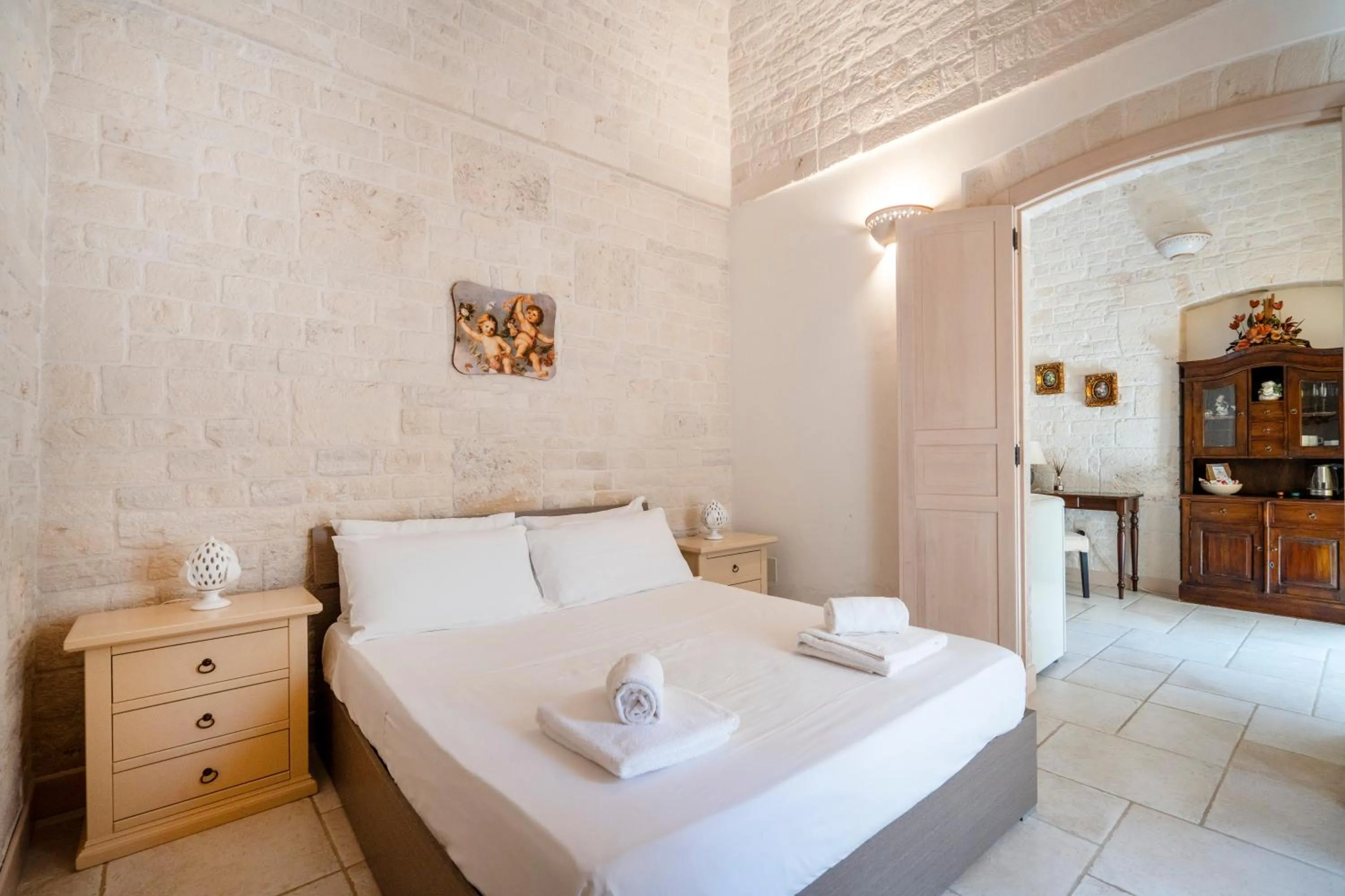 Bedroom, Bed in Trulli Contento - Rooms & Apartments