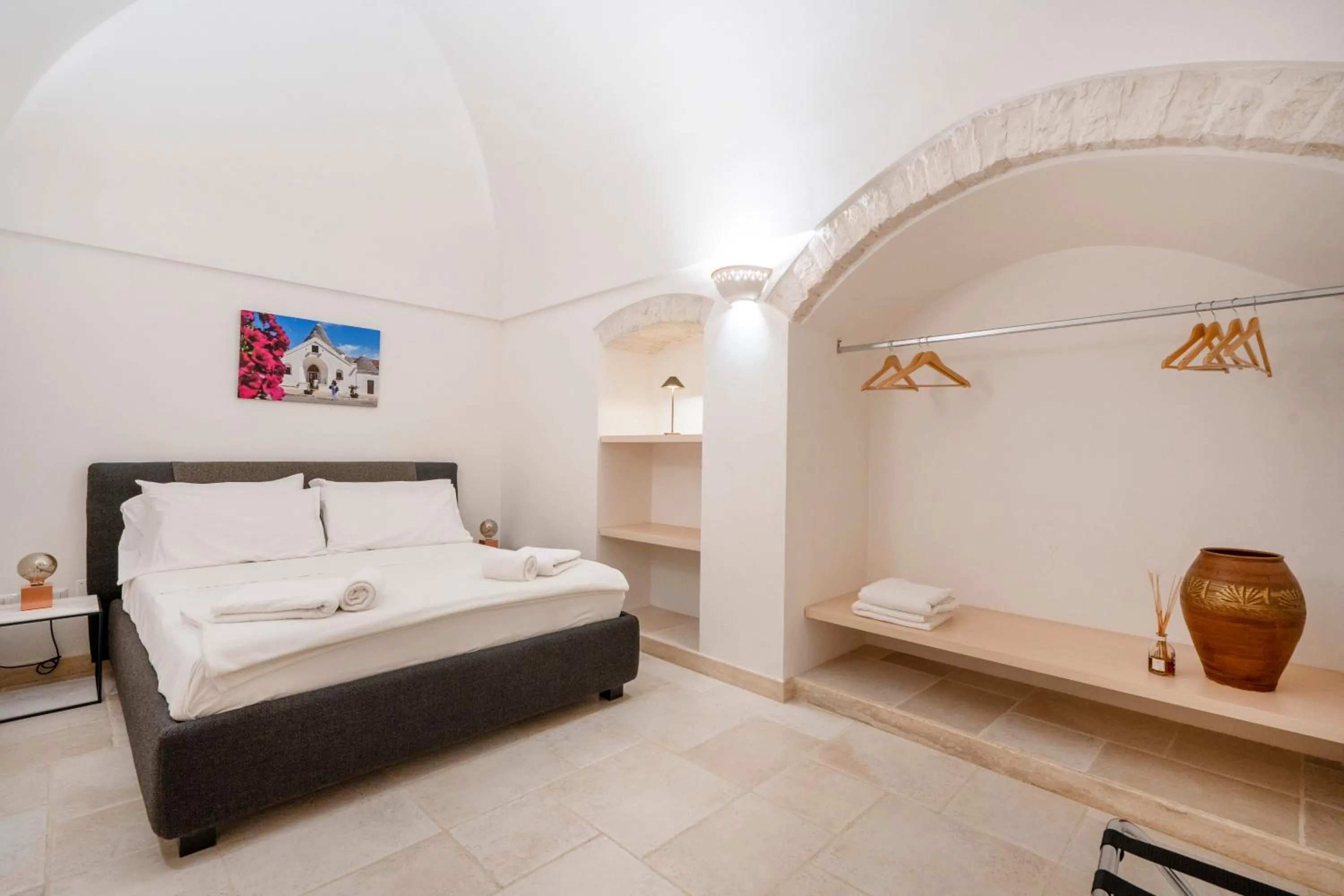 Bedroom, Bed in Trulli Contento - Rooms & Apartments