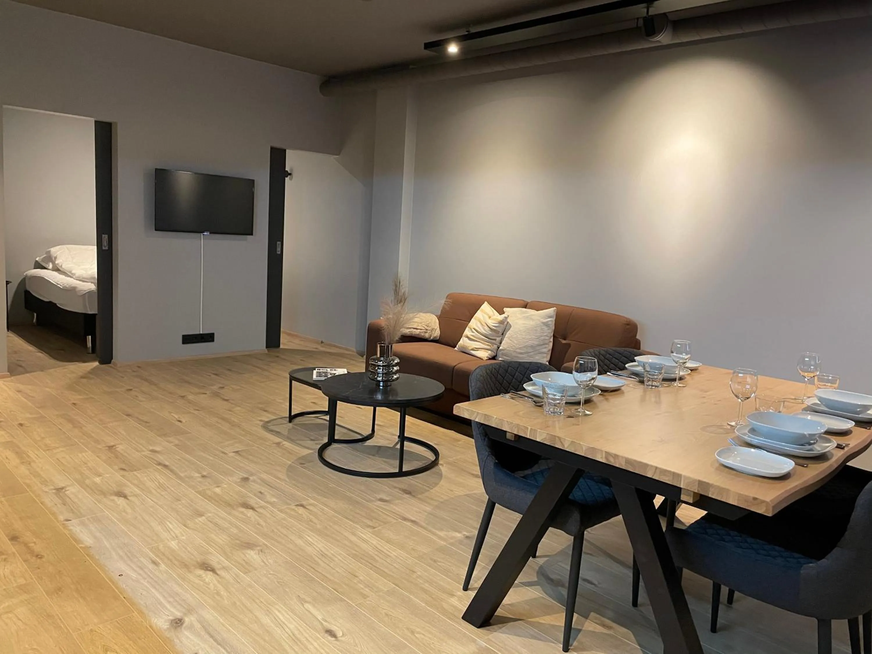 Living room, Bed in North Apartments Suites