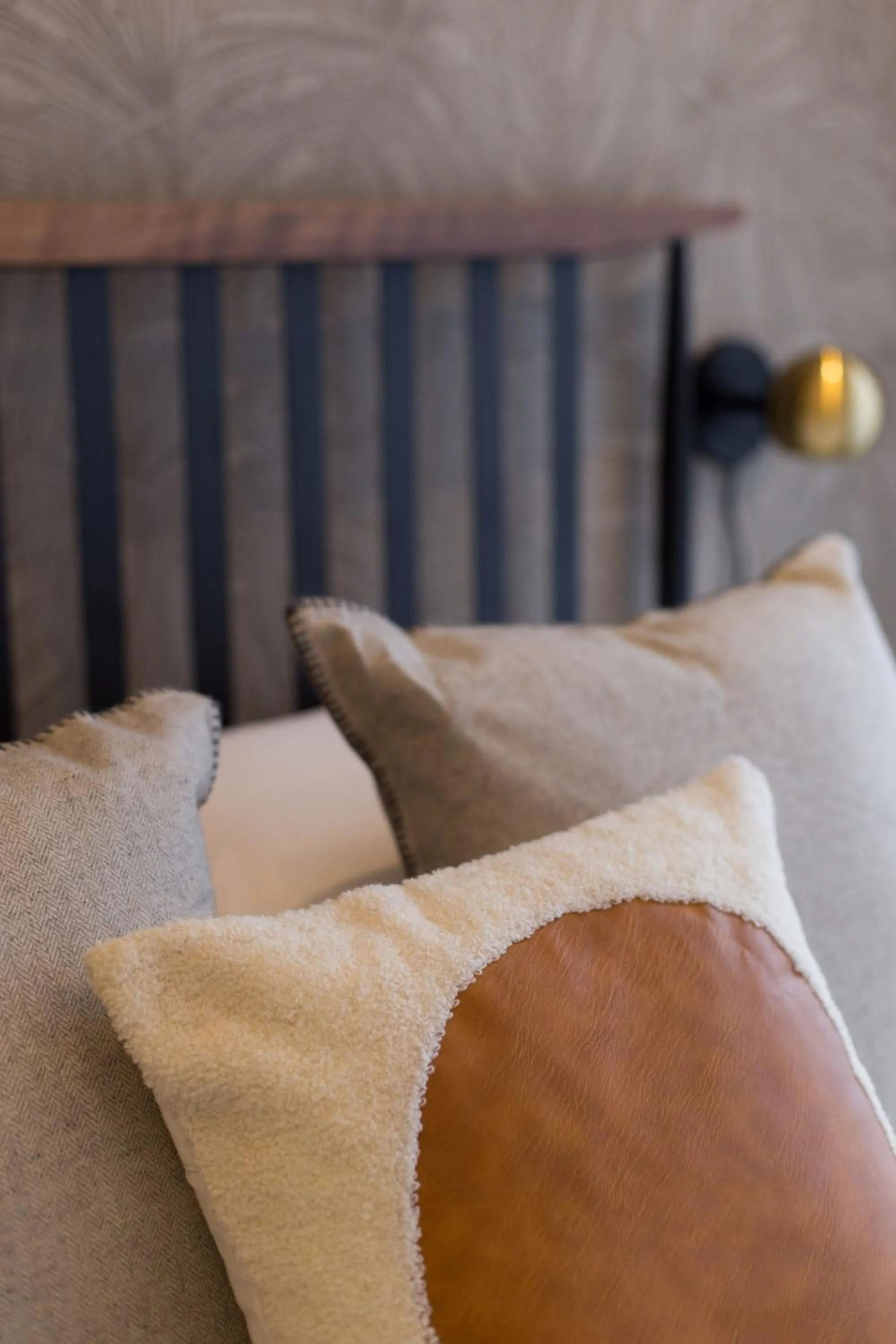 Bed in Blue Tropics Studio in Little Italy with kitchen by Den Stays