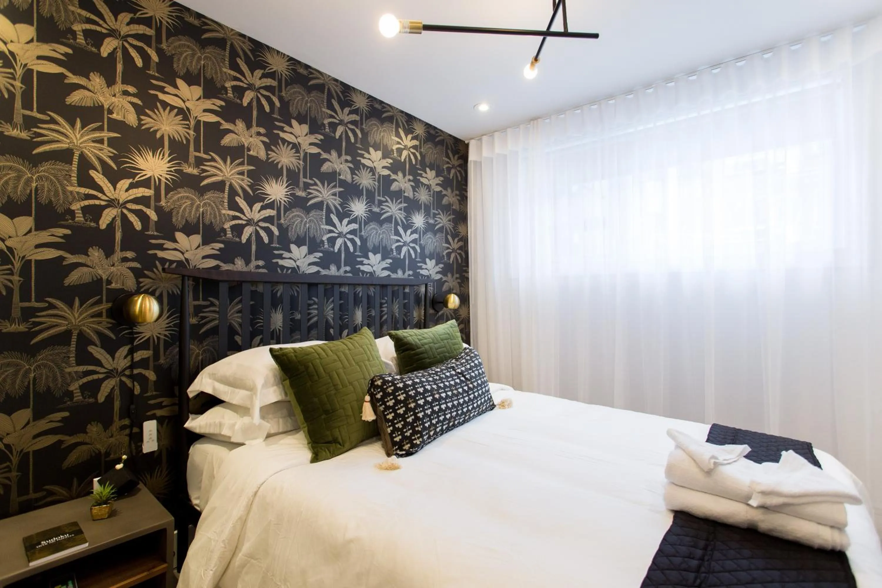 Bed in 16 Studio Apartment-Hotel in Little Italy by Den Stays