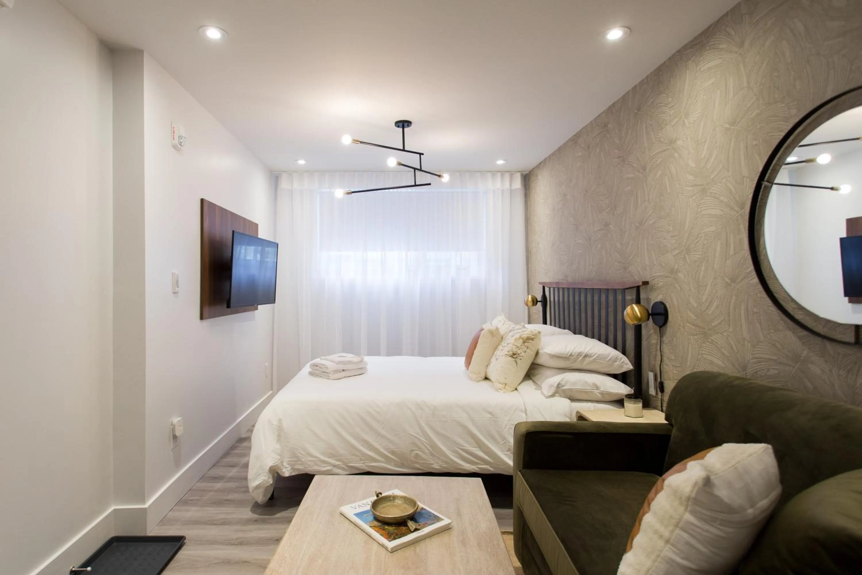 Bed in 16 Studio Apartment-Hotel in Little Italy by Den Stays