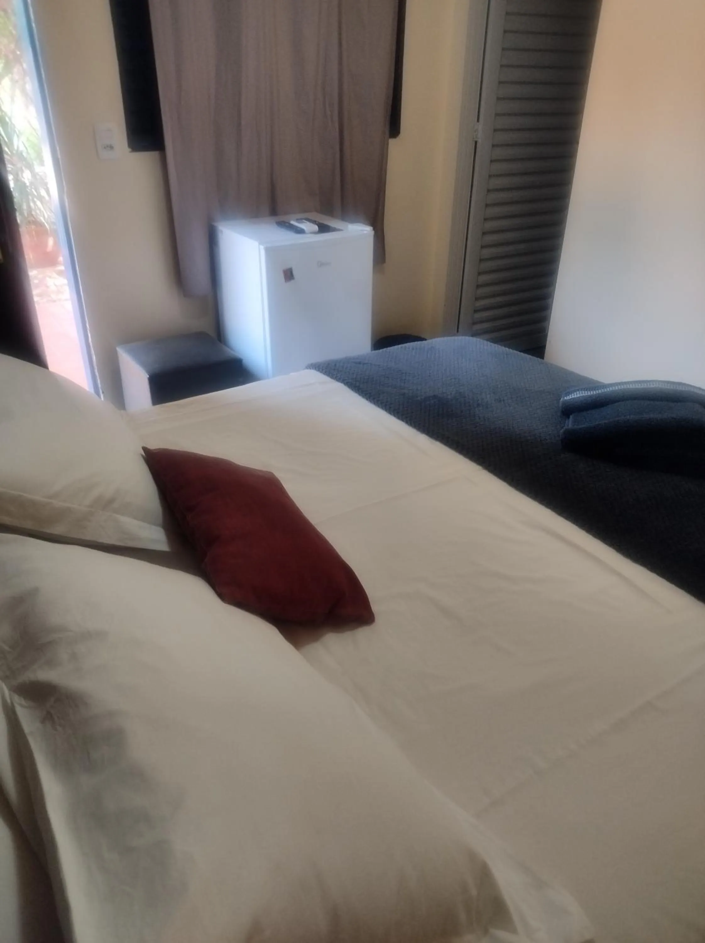 Photo of the whole room, Bed in Pousada Canto dos Passaros