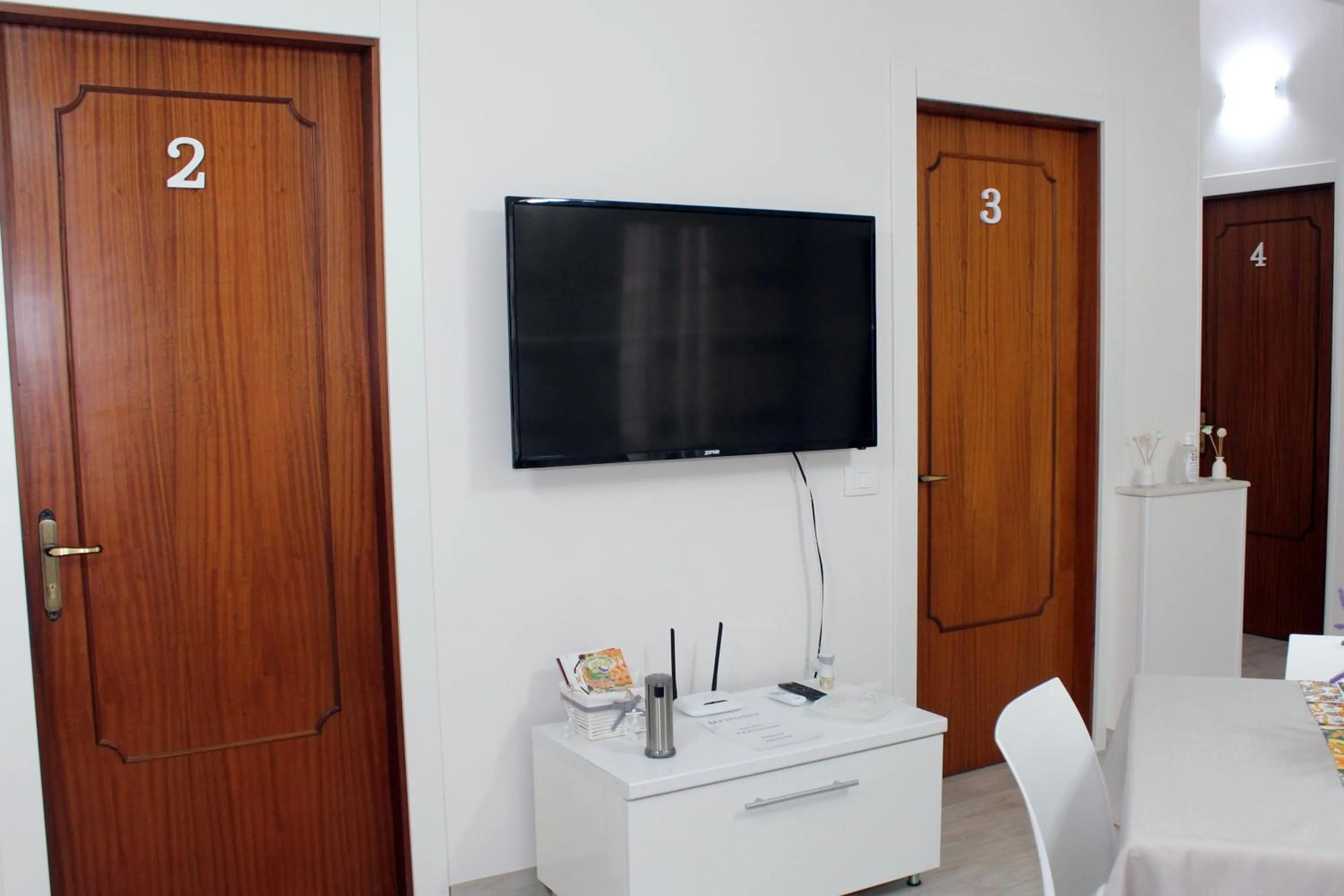 Communal lounge/ TV room in B&B Ciccannina