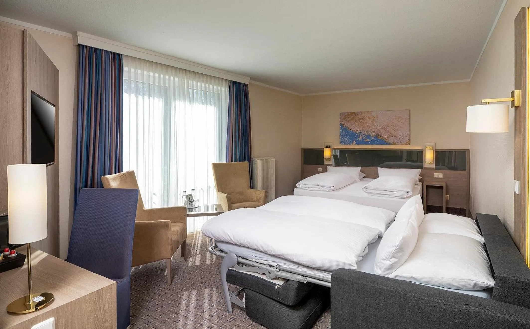 Photo of the whole room, Bed in Parkhotel Berghölzchen