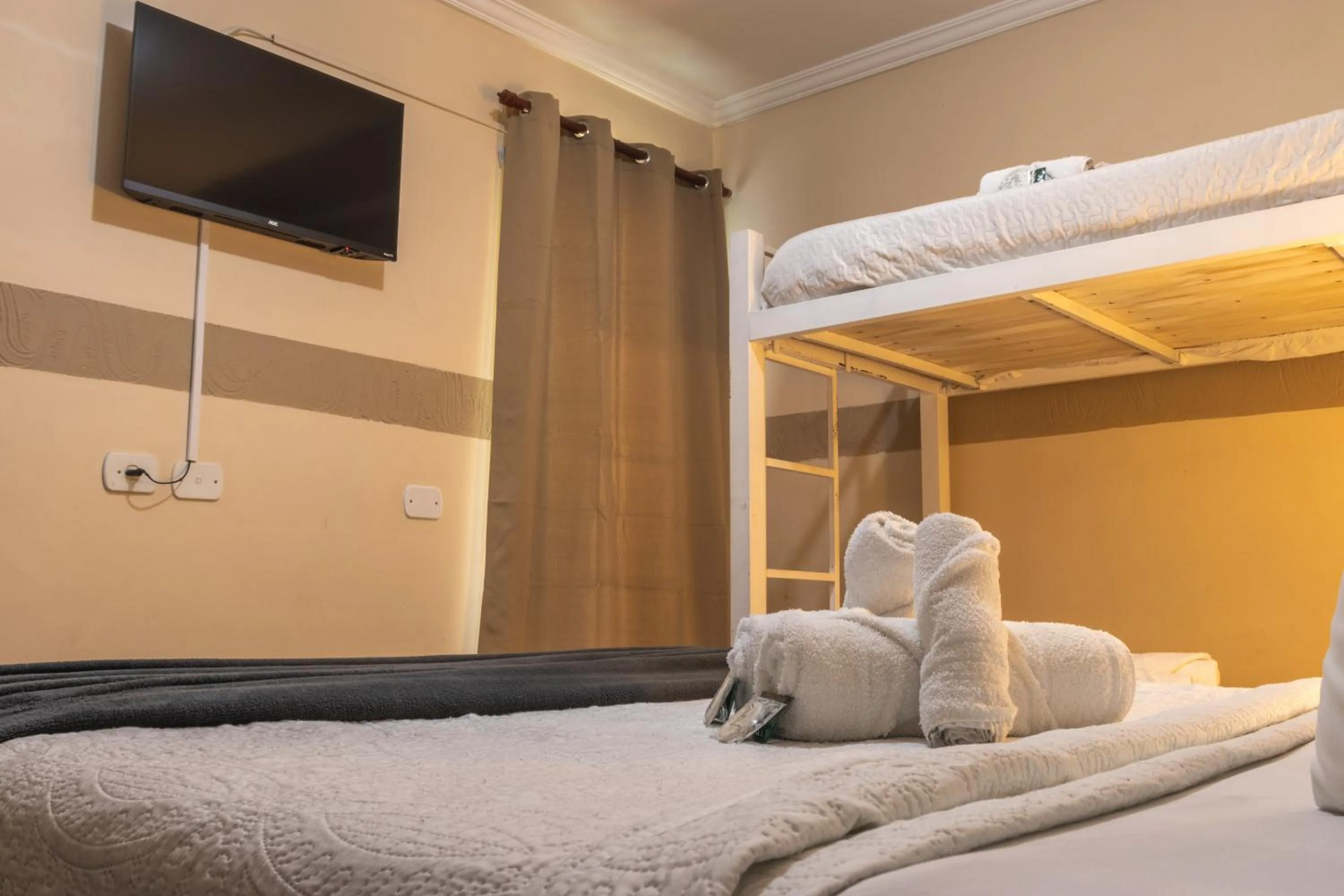 Bed in Pousada Araucária