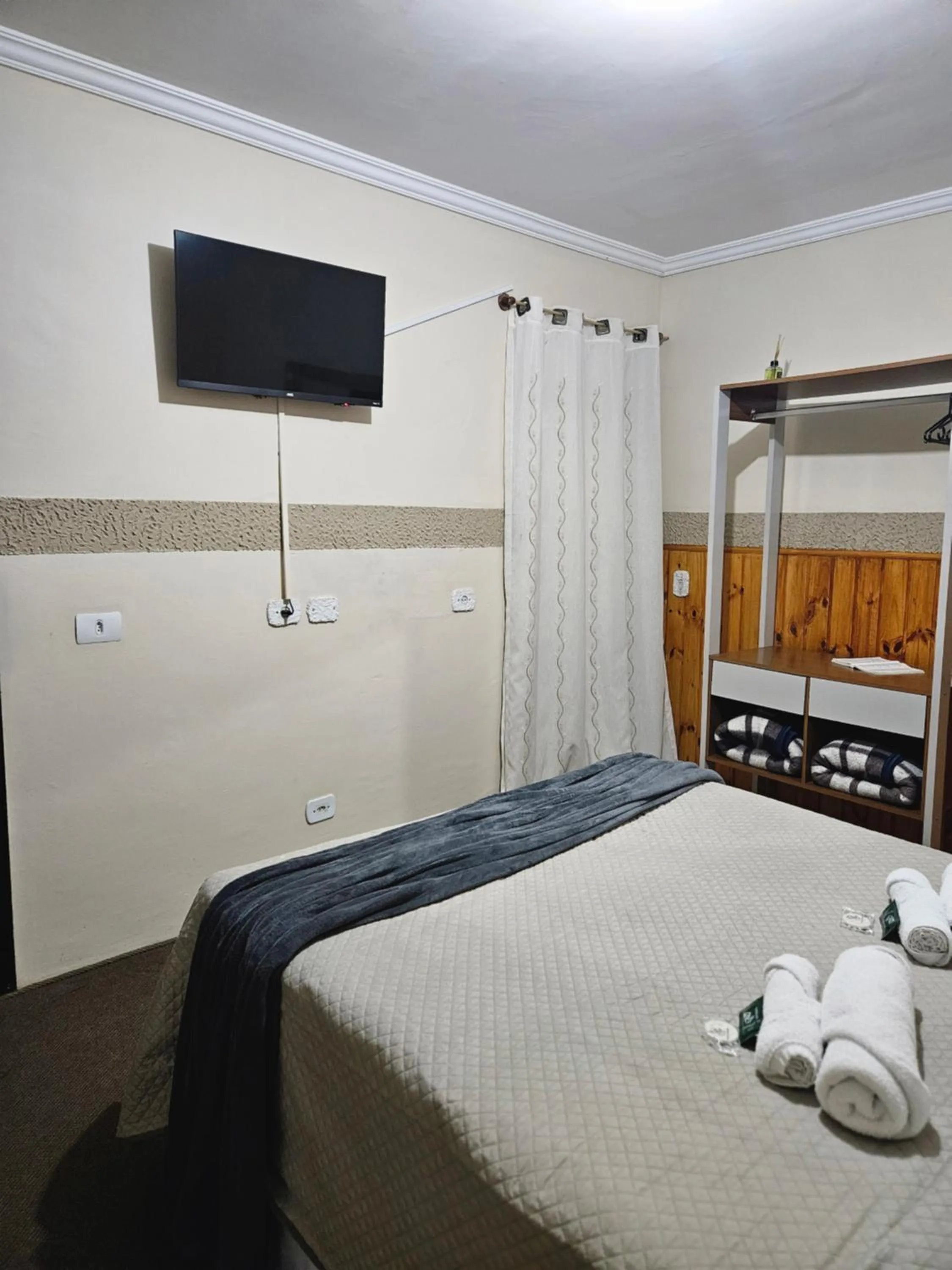 Bed in Pousada Araucária