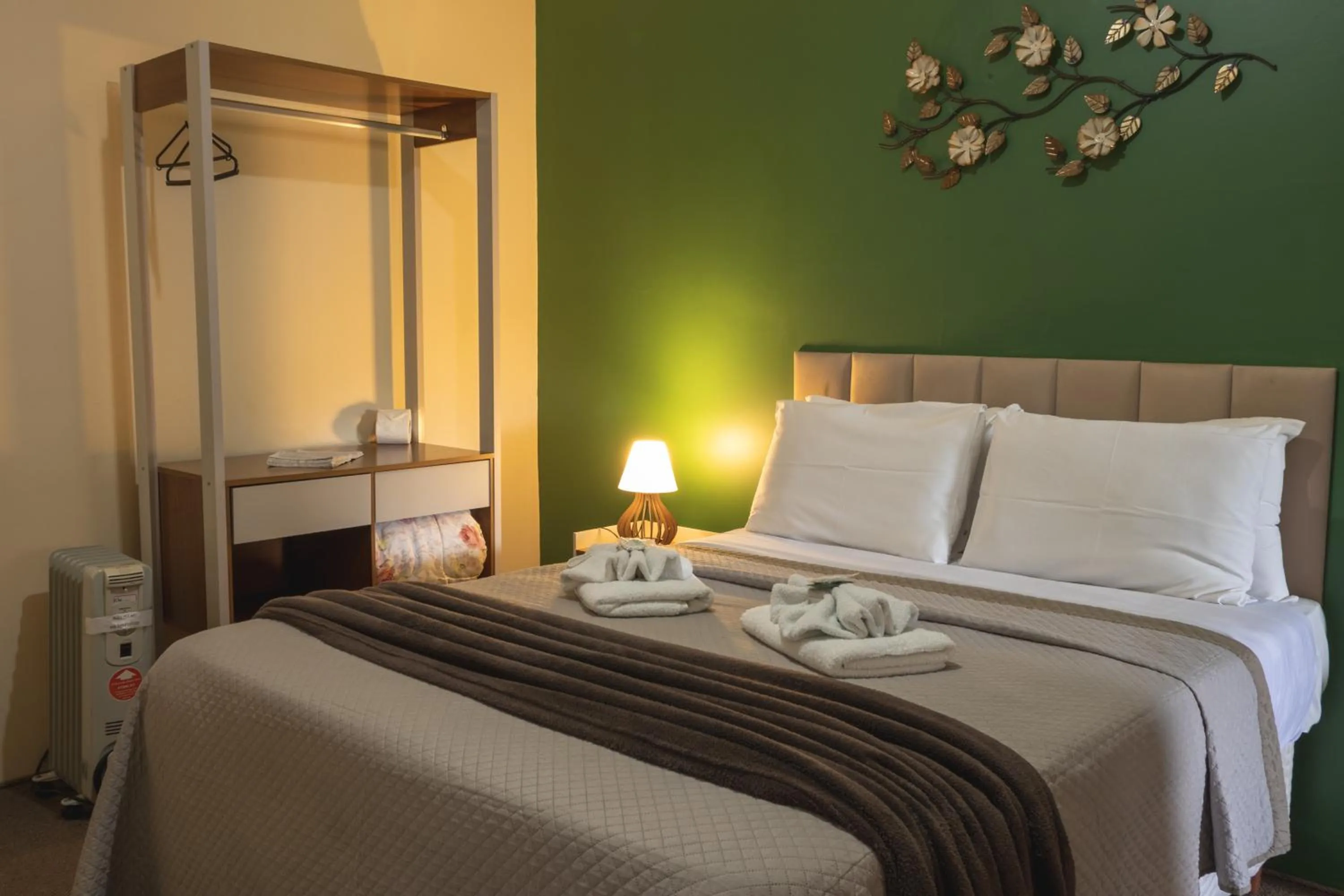 Bed in Pousada Araucária